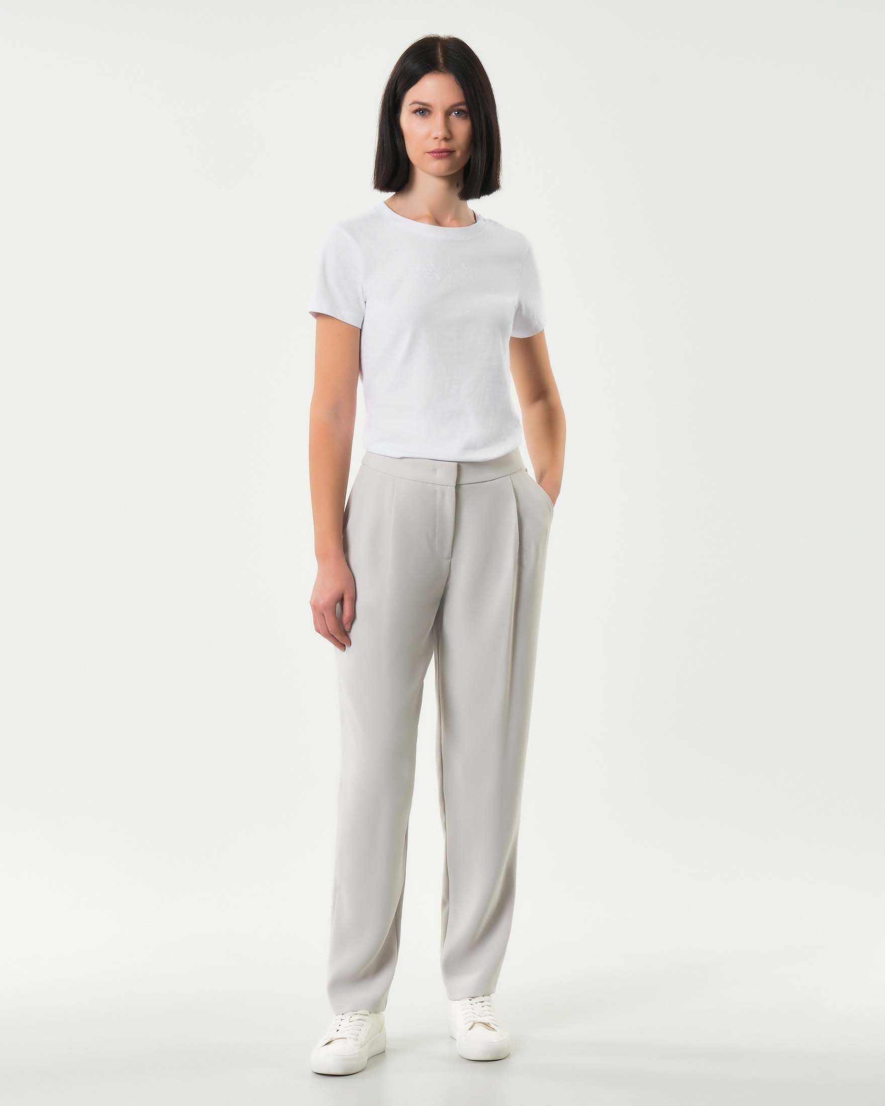 Pantaloni color gesso Armani Exchange in tessuto fluido con pinces in vita