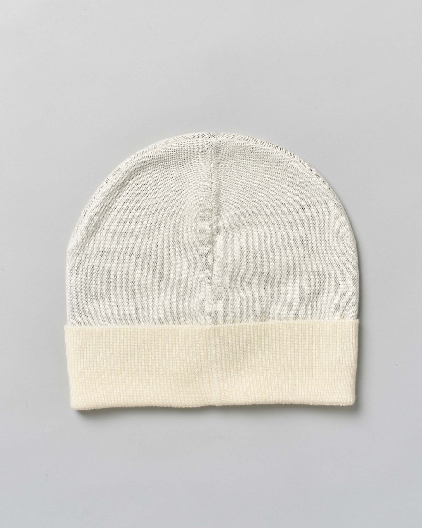 Berretto EA7 panna in maglia a costine con risvolto e maxi logo jacquard nero image