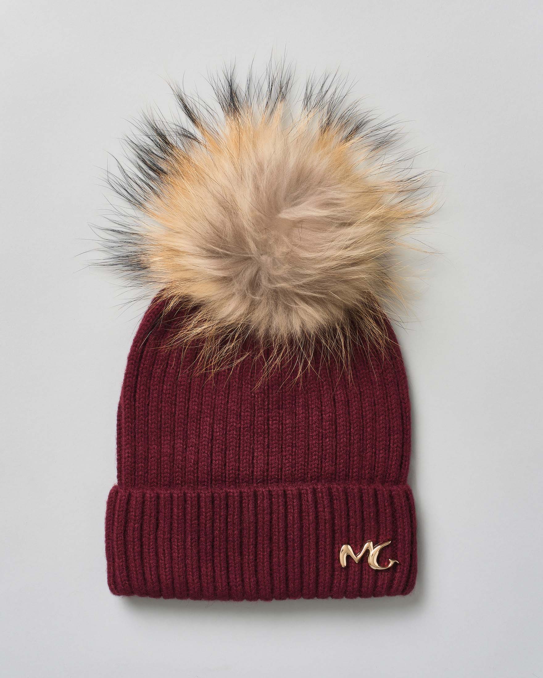 Berretto Manila Grace bordeaux a coste con pompon in pelliccia
