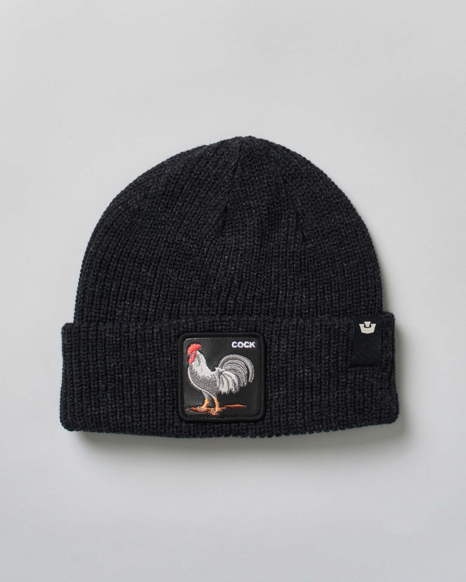 Berretto Goorin Bros nero in maglia a costine con patch gallo