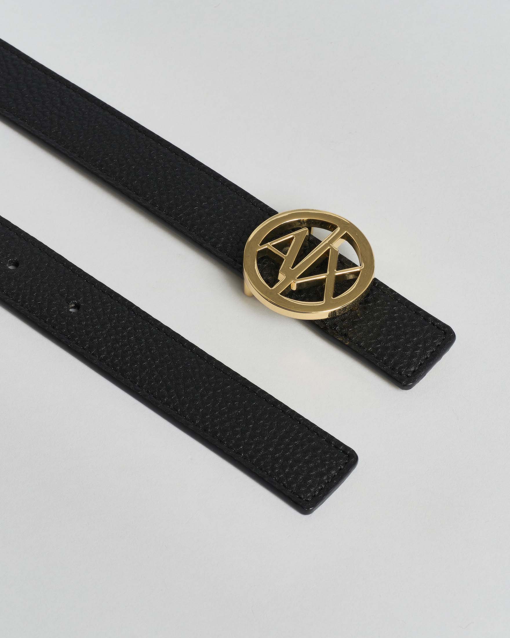 Cintura reversibile nera e oro Armani Exchange in similpelle liscia con fibbia tonda logo dorata image