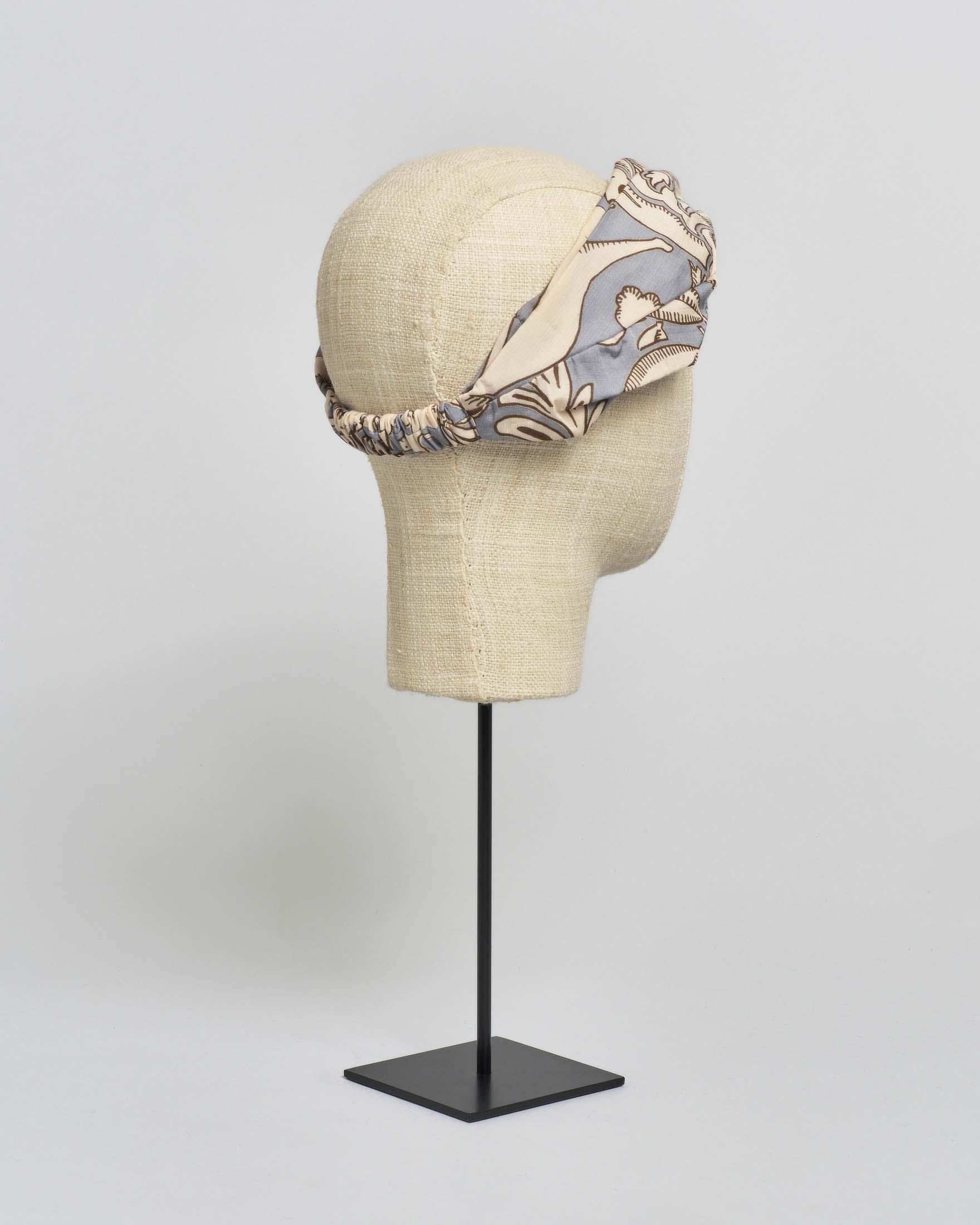 Fascia per capelli beige One Hundred Stars a fantasia ramage grigia in misto modal e cupr image