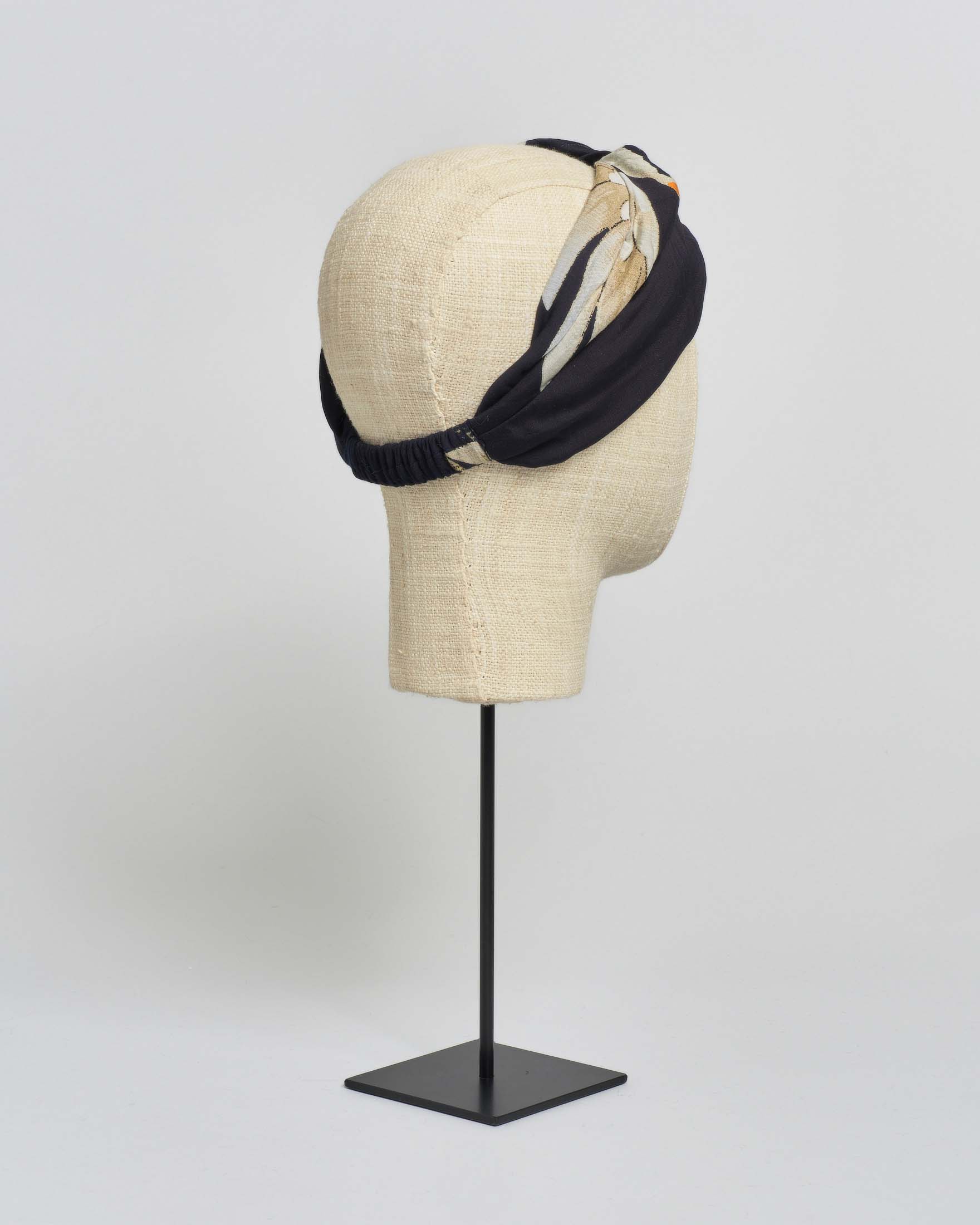 Fascia per capelli nera One Hundred Stars a fantasia cicogne in misto modal e cupr image