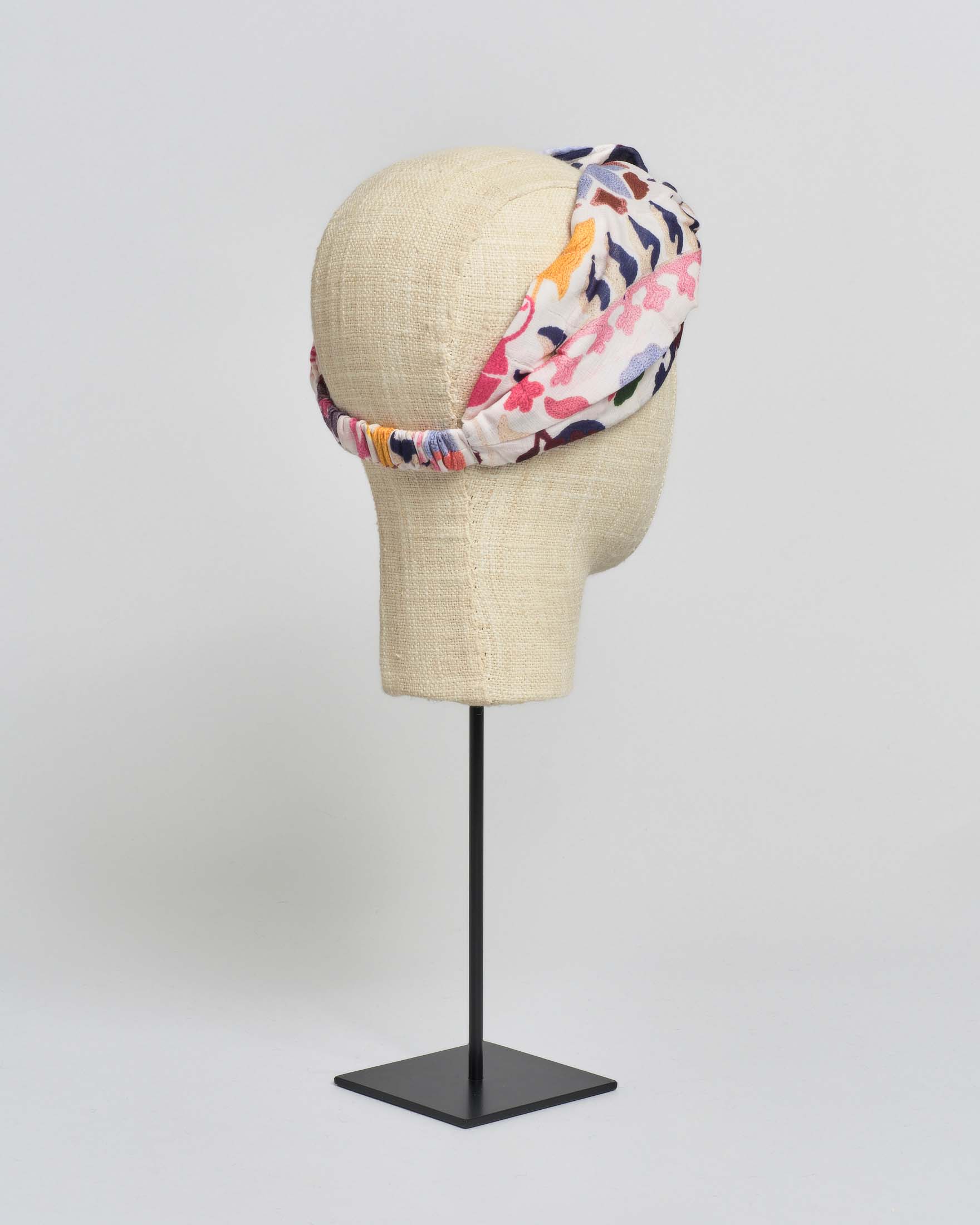 Fascia per capelli bianca One Hundred Stars a fantasia multicolore in misto modal e cupr image