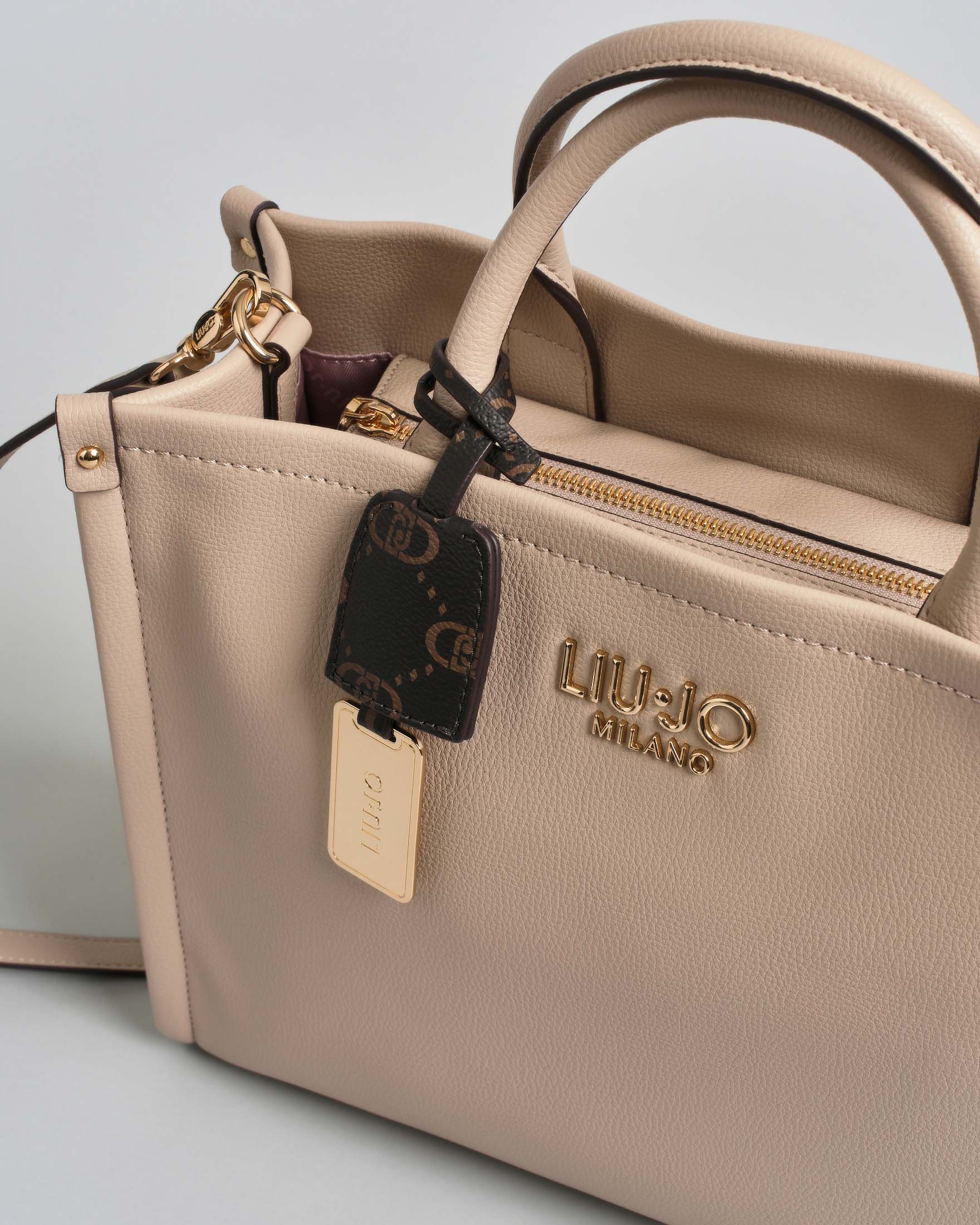 Borsa shopping Liu Jo Accessories beige in similpelle con logo metallico frontale image