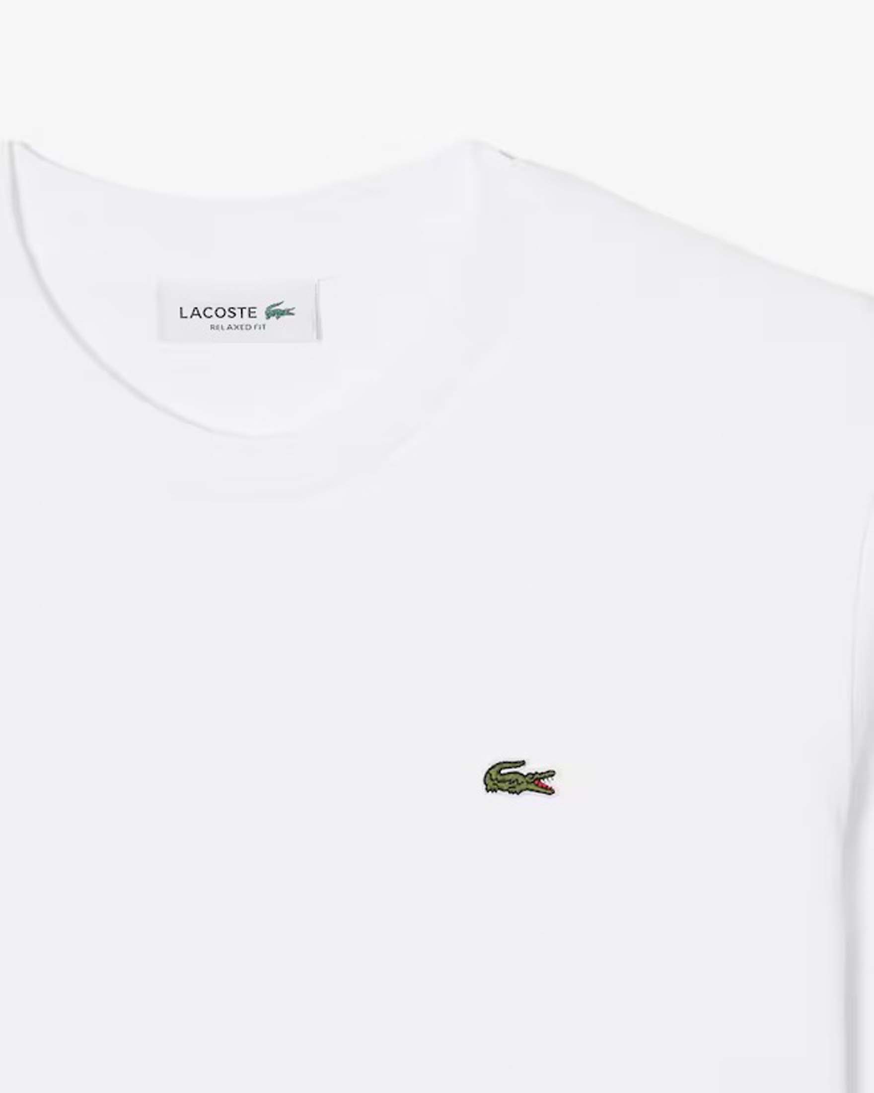 T-shirt bianca Lacoste in cotone con scollo tondo e logo cucito sul petto a contrasto di colore