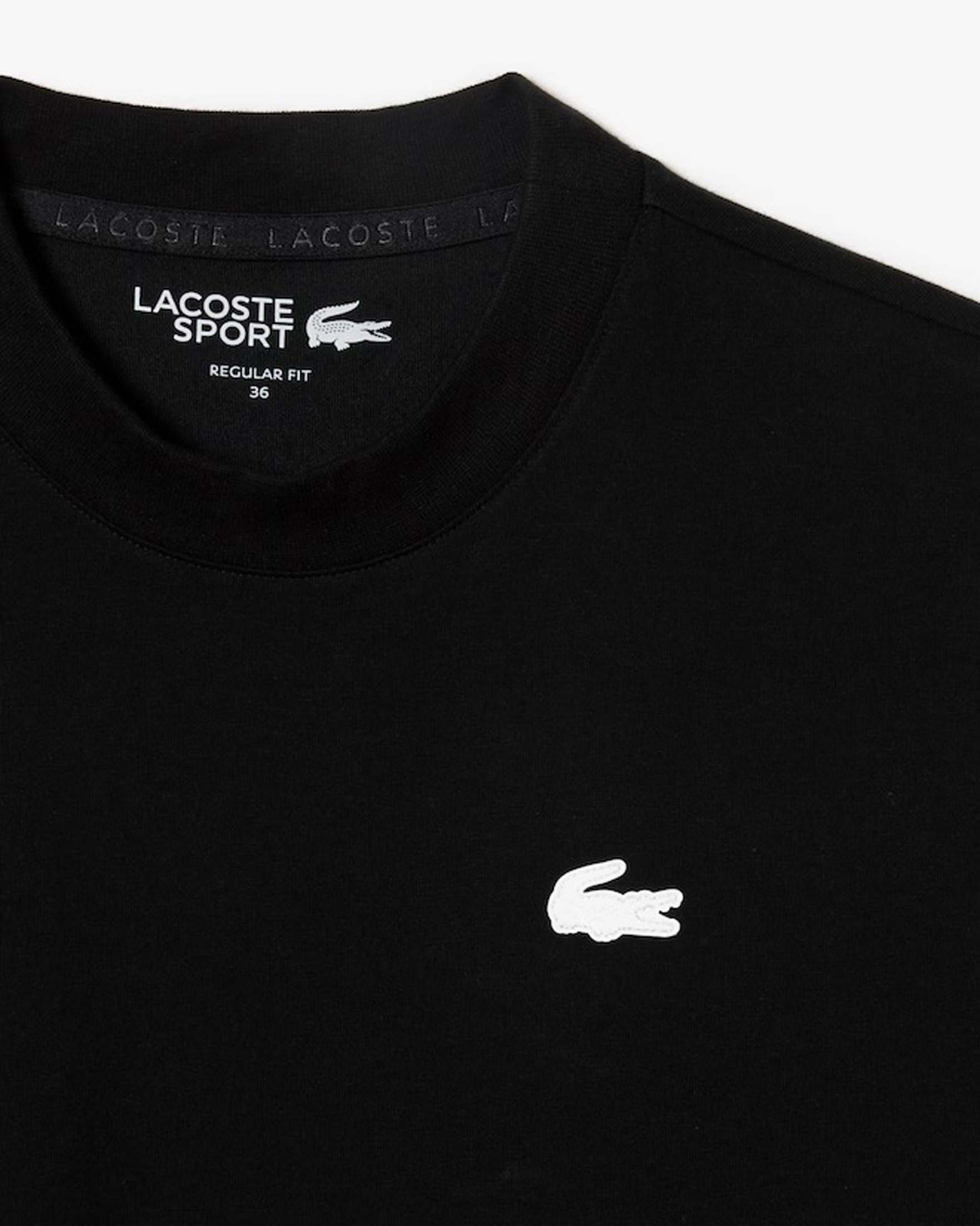T-shirt nera Lacoste in cotone stretch con scollo tondo e logo bianco gommato cucito sul petto