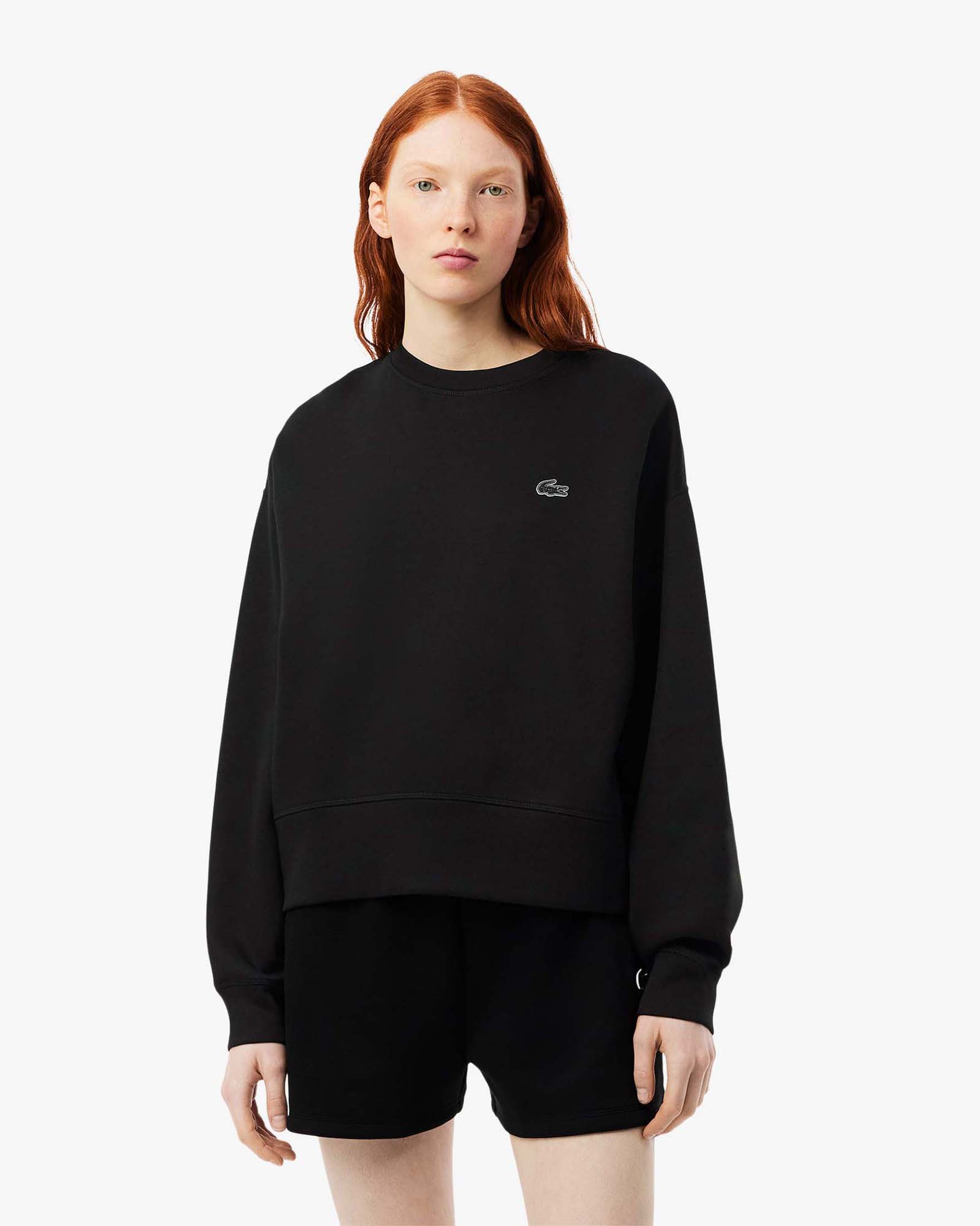 Felpa girocollo nera Lacoste oversize in misto cotone effetto neoprene con scritta logo sul petto e sulla spalla