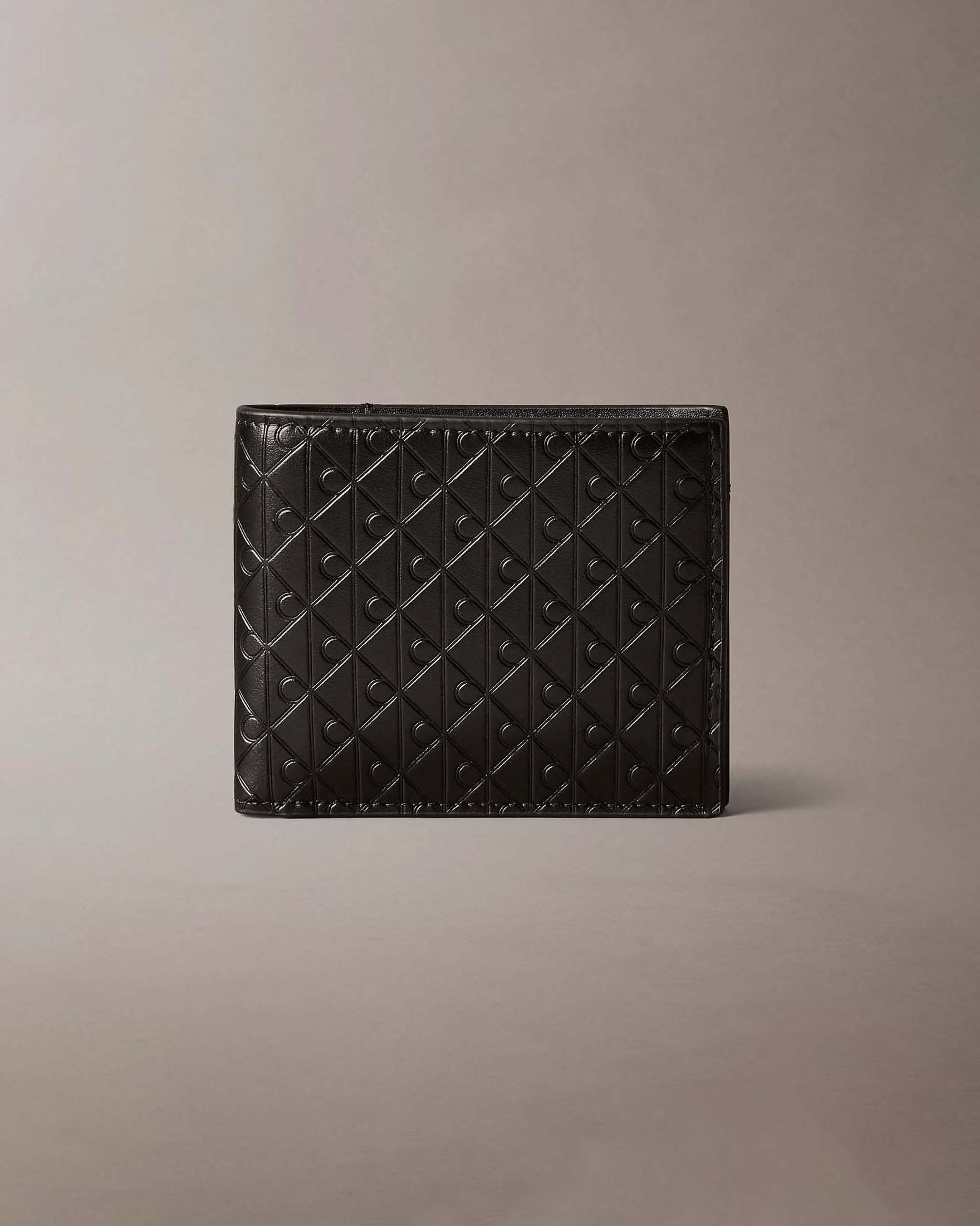 Portafoglio Calvin Klein Jeans nero in pelle con logo monogramma embossato allover image