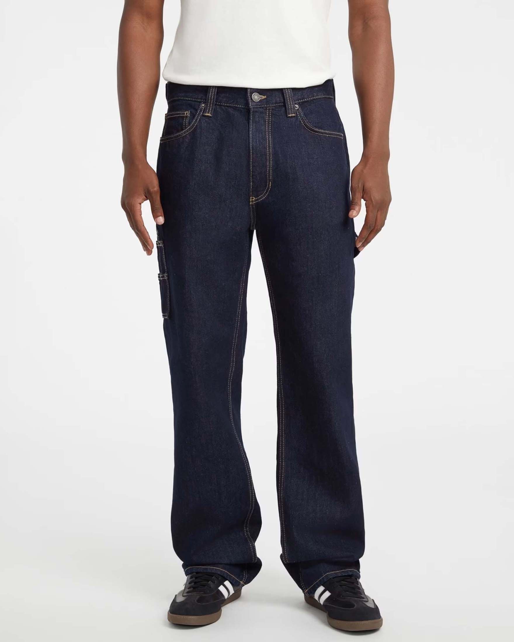 Jeans carpenter Guess Jeans blu dark wash in cotone rigido con tasche e logo applicato image