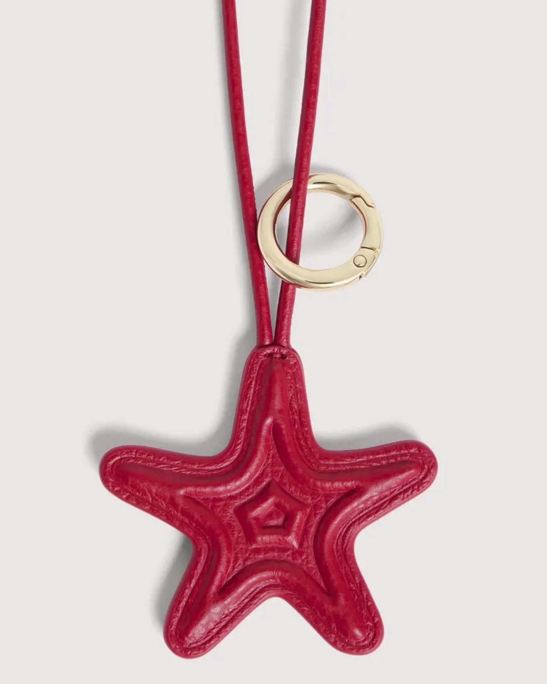 Portachiavi Shell Padded rosso Coccinelle in pelle martellata a forma di stella marina image