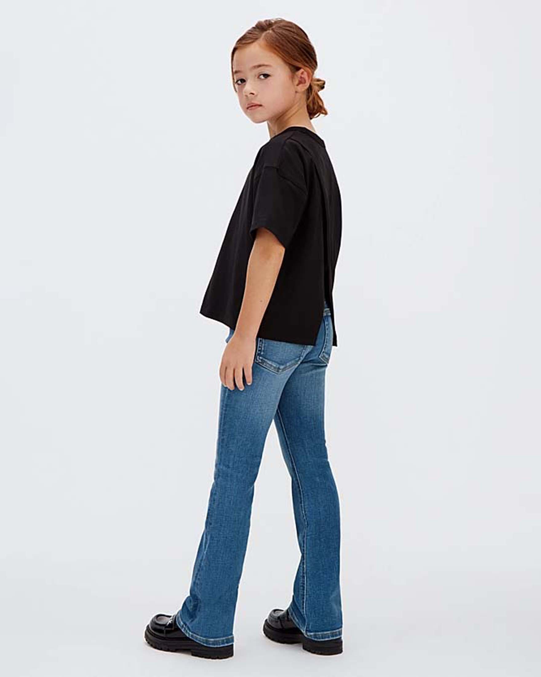 Jeans Calvin Klein flare a lavaggio medio stone washed image