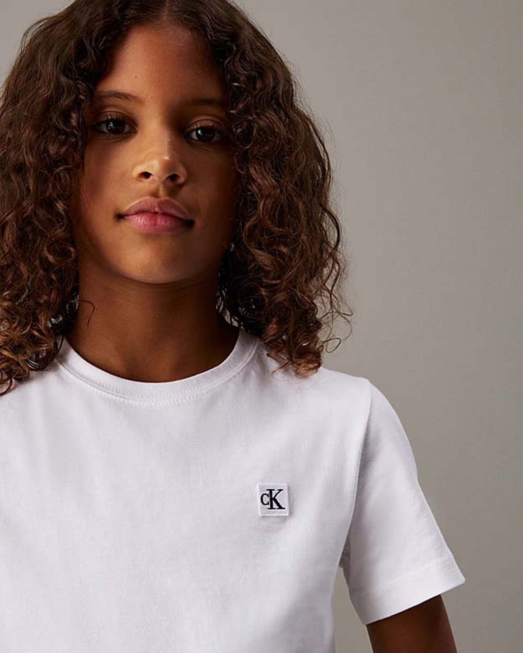 T-shirt bianca Calvin Klein in cotone a maniche corte con logo nero