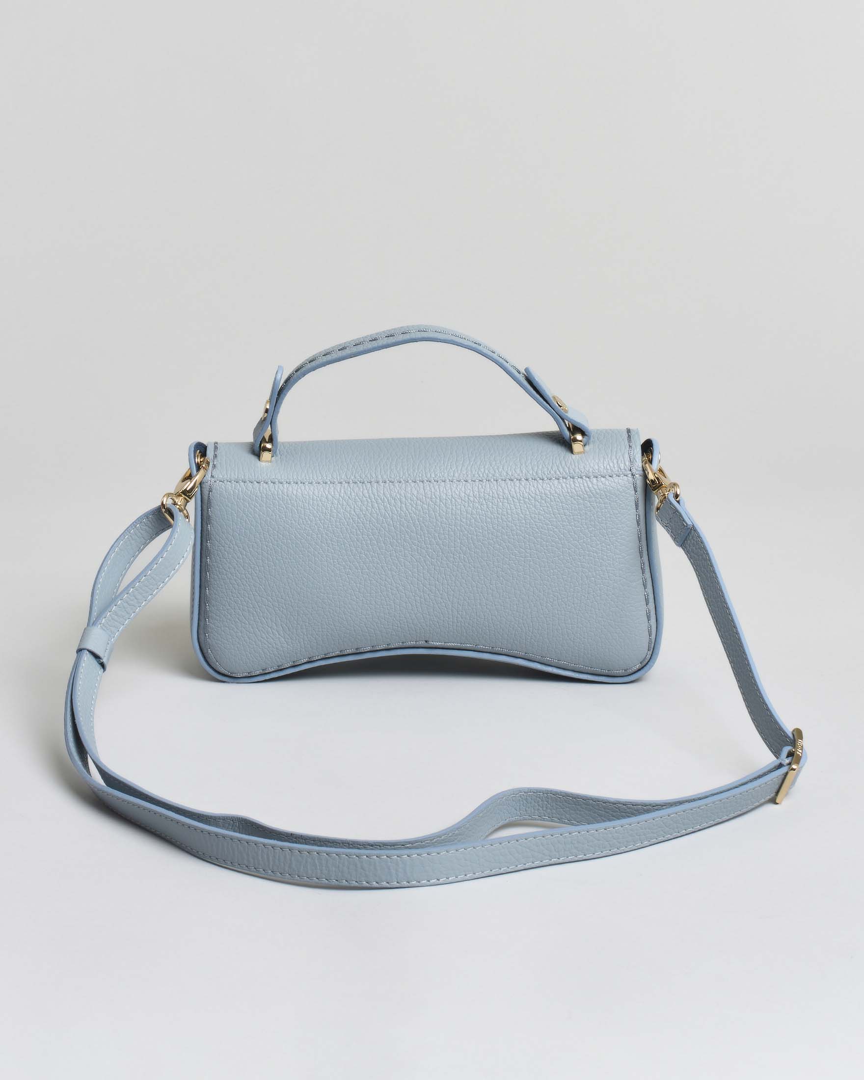 Mini Bag Visonà a baguette in pelle martellata azzurra con tracolla removibile