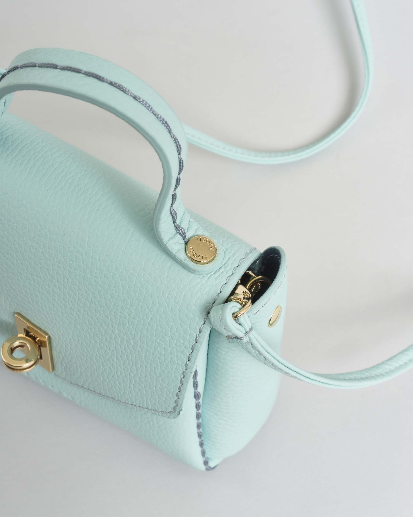 Mini Bag Visonà in pelle martellata verde acqua con tracolla removibile image