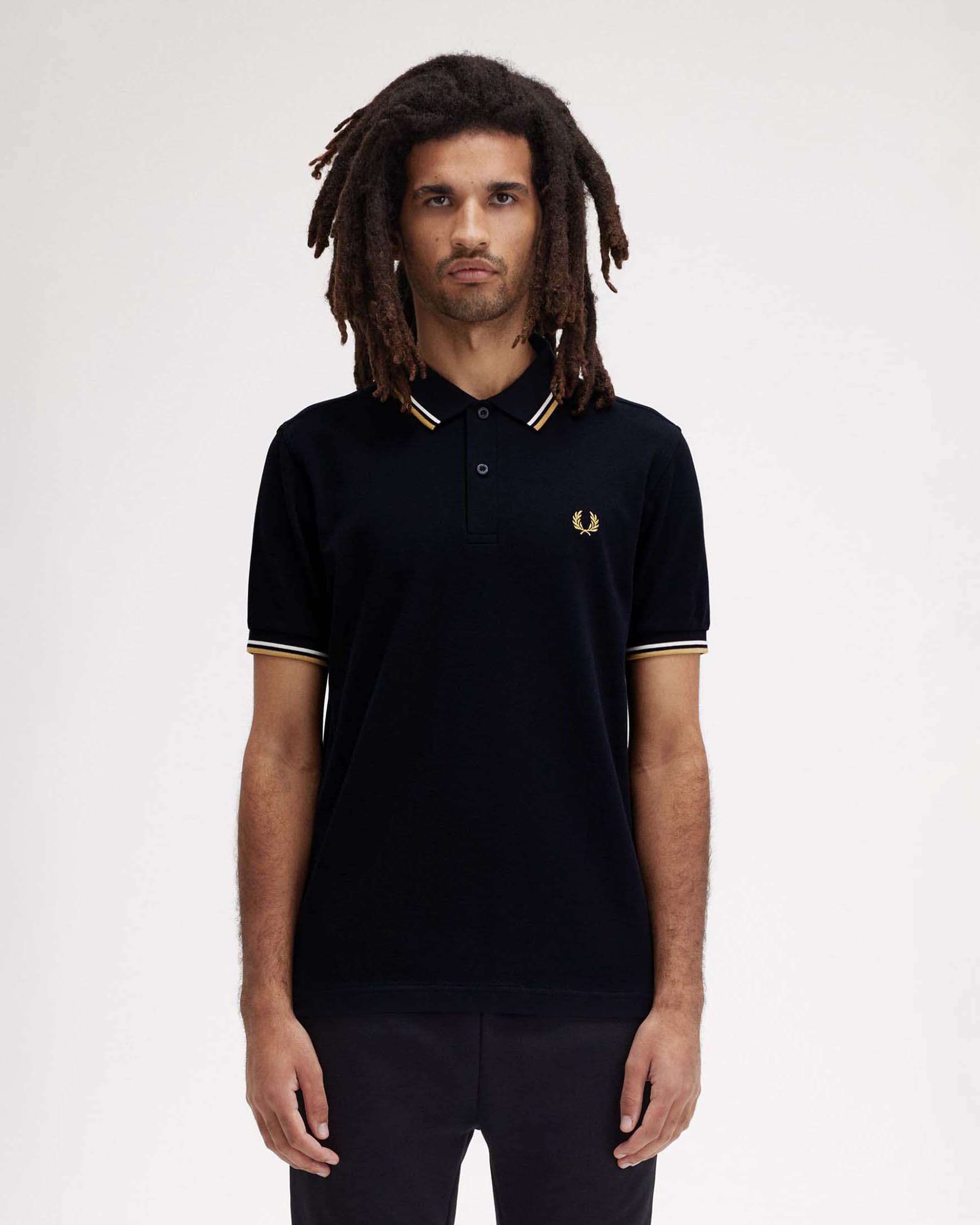 Polo Fred Perry blu mezza manica con bordino bianco e oro