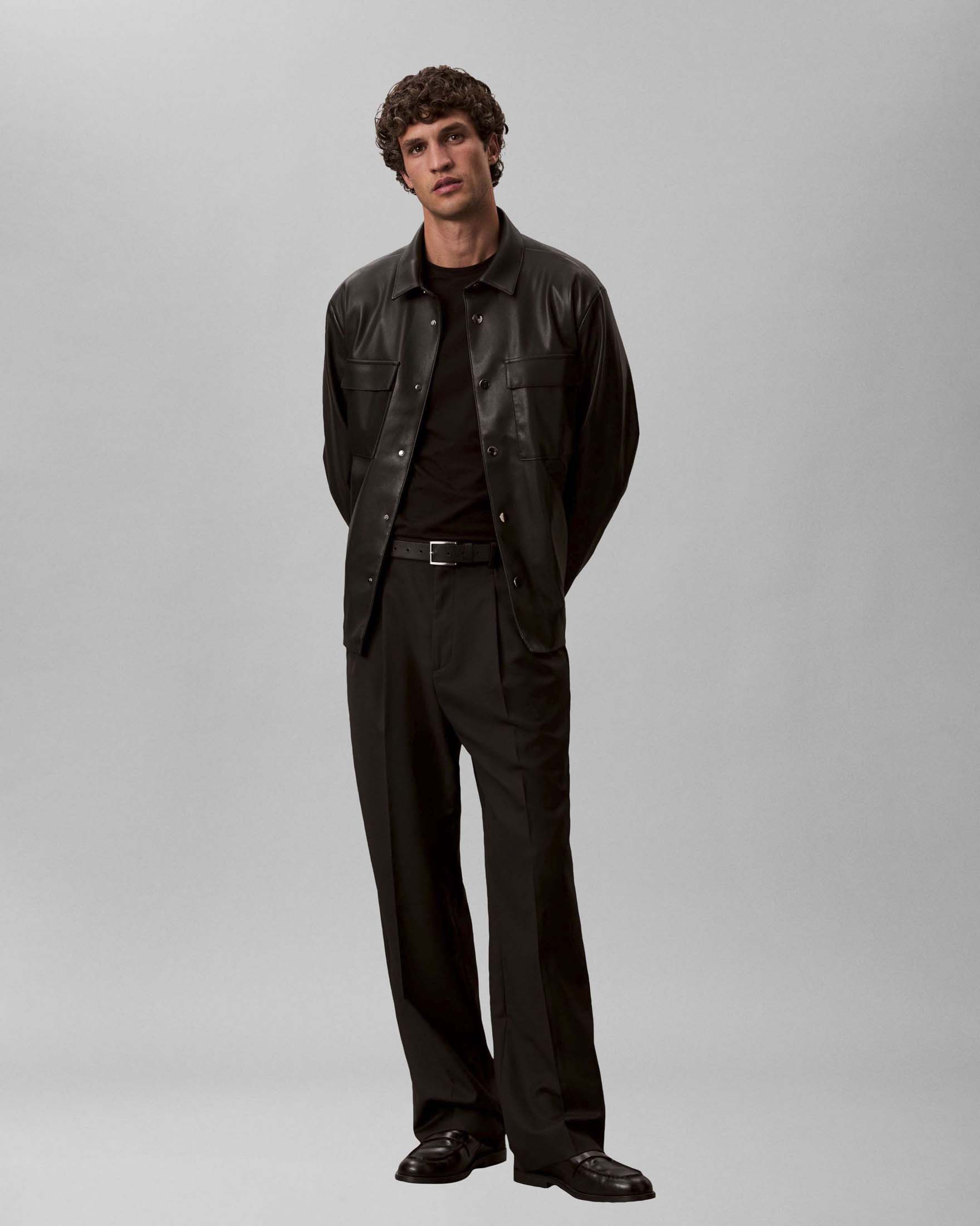 Giubbino Jeans nero in similpelle con chiusura a bottoni