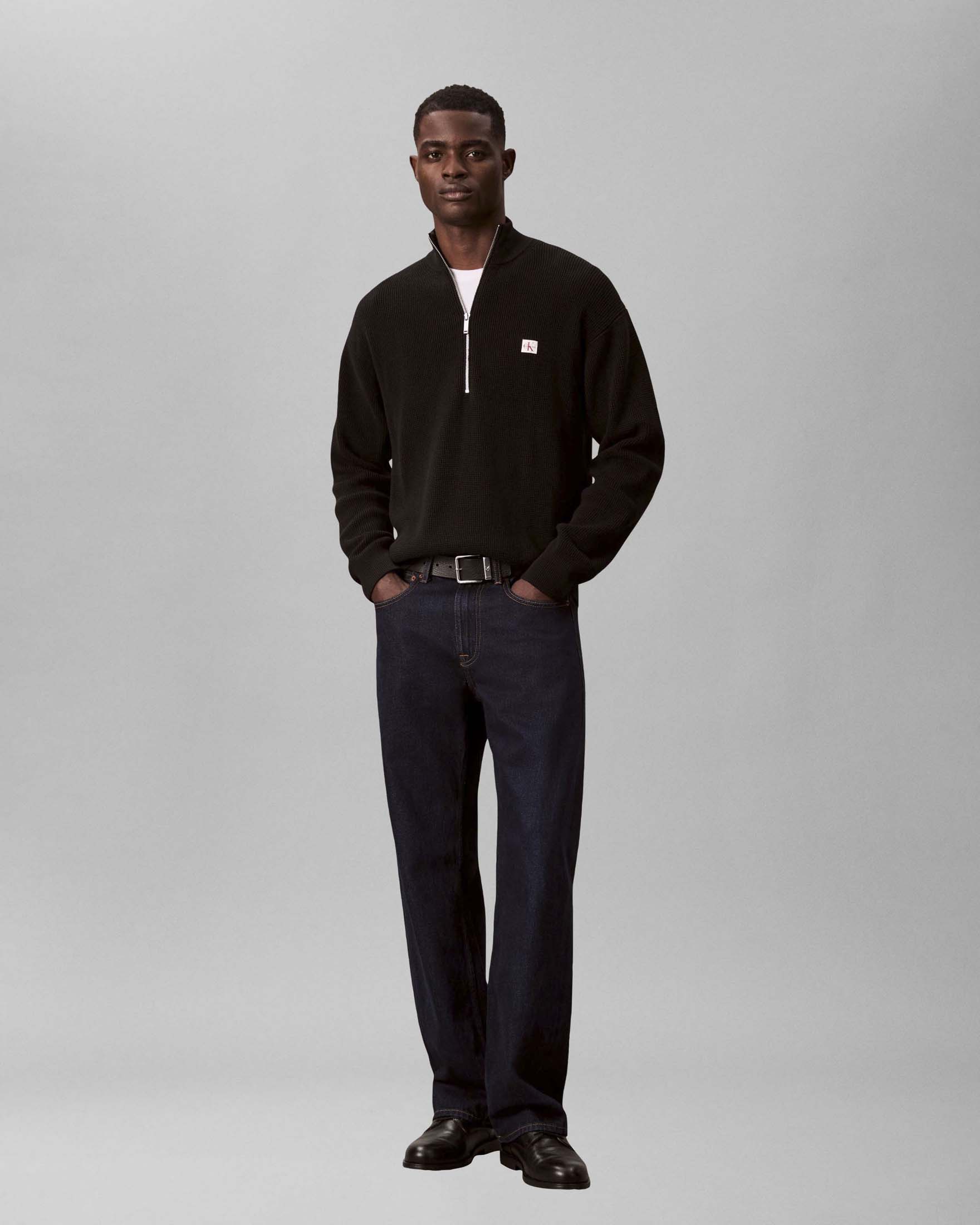 Maglione Calvin Klein Jeans nero in cotone waffle con mezza zip e patch logo