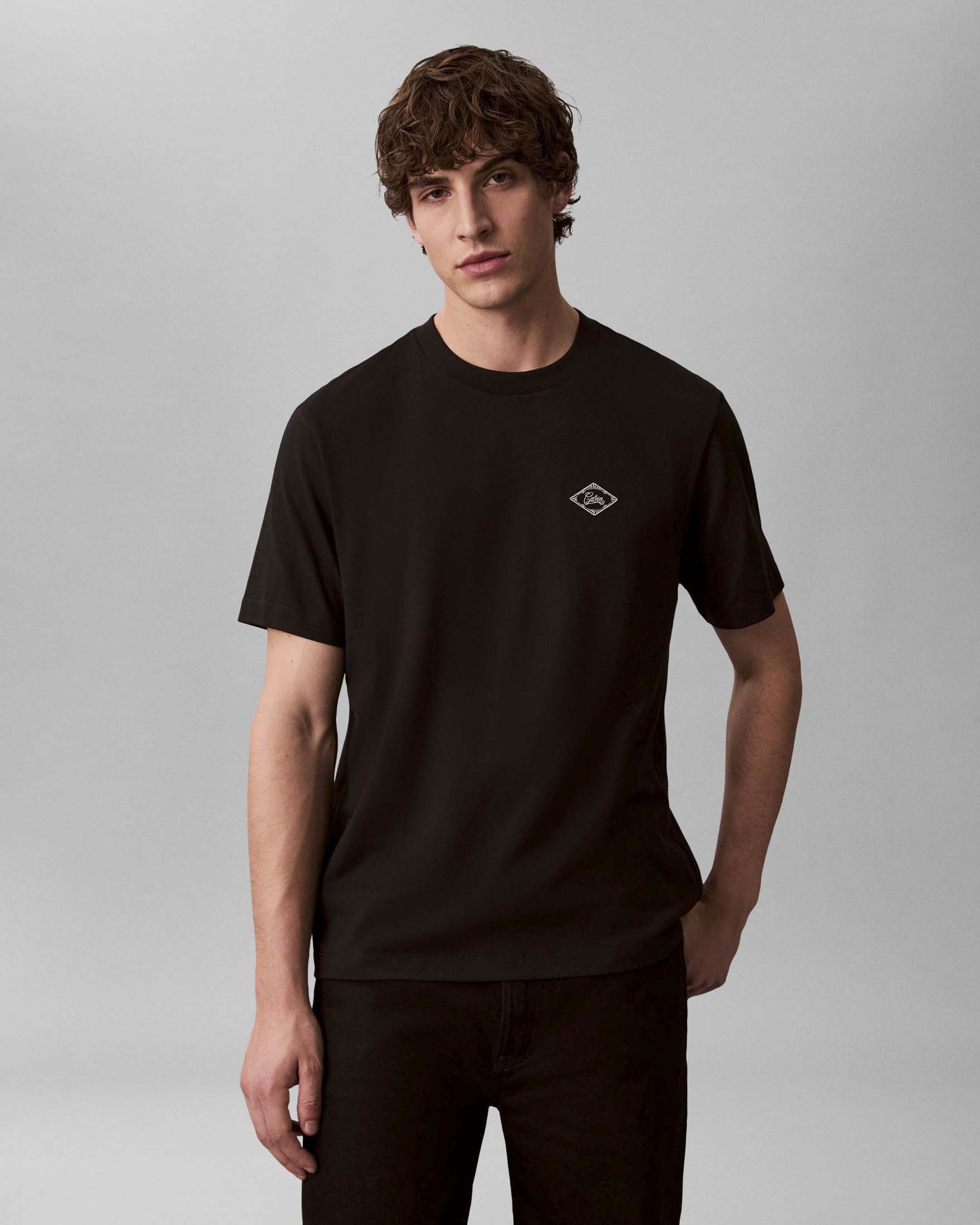 T-shirt Calvin Klein Jeans nera in cotone con stampa logo sul petto image