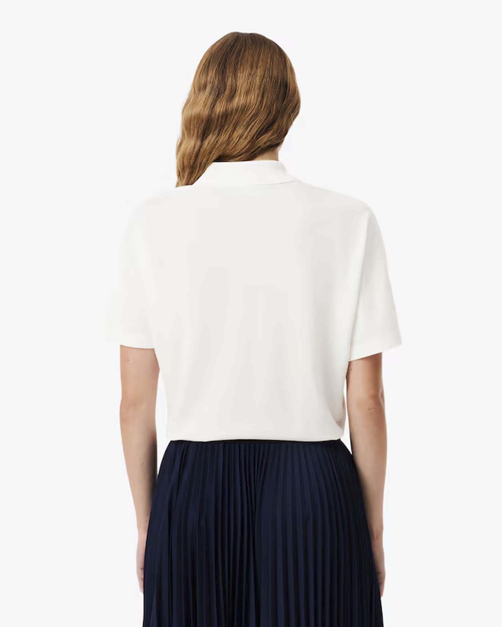 Polo Lacoste relaxed fit avorio in piqué di cotone image