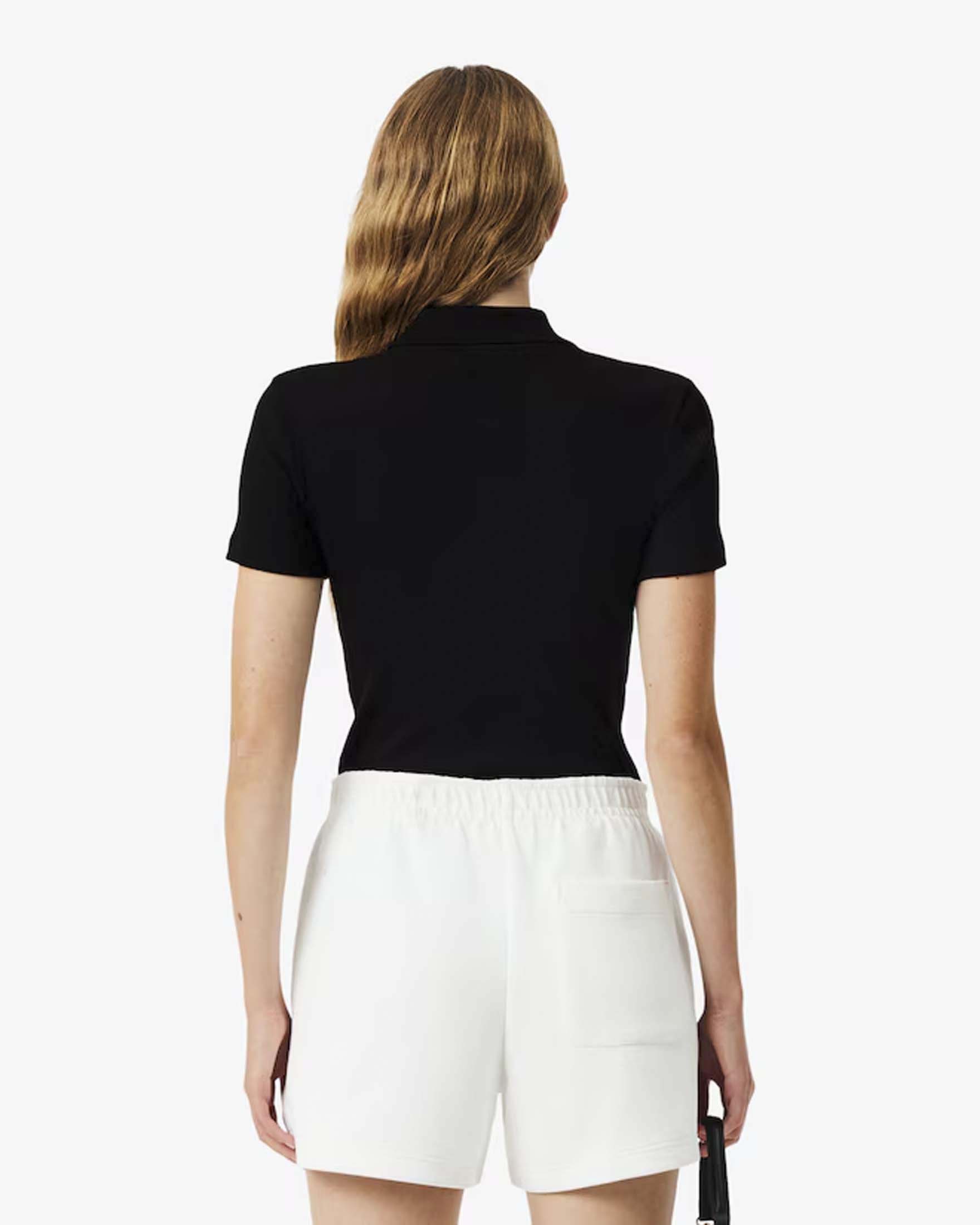 Polo nera Lacoste in cotone a costine slim fit image