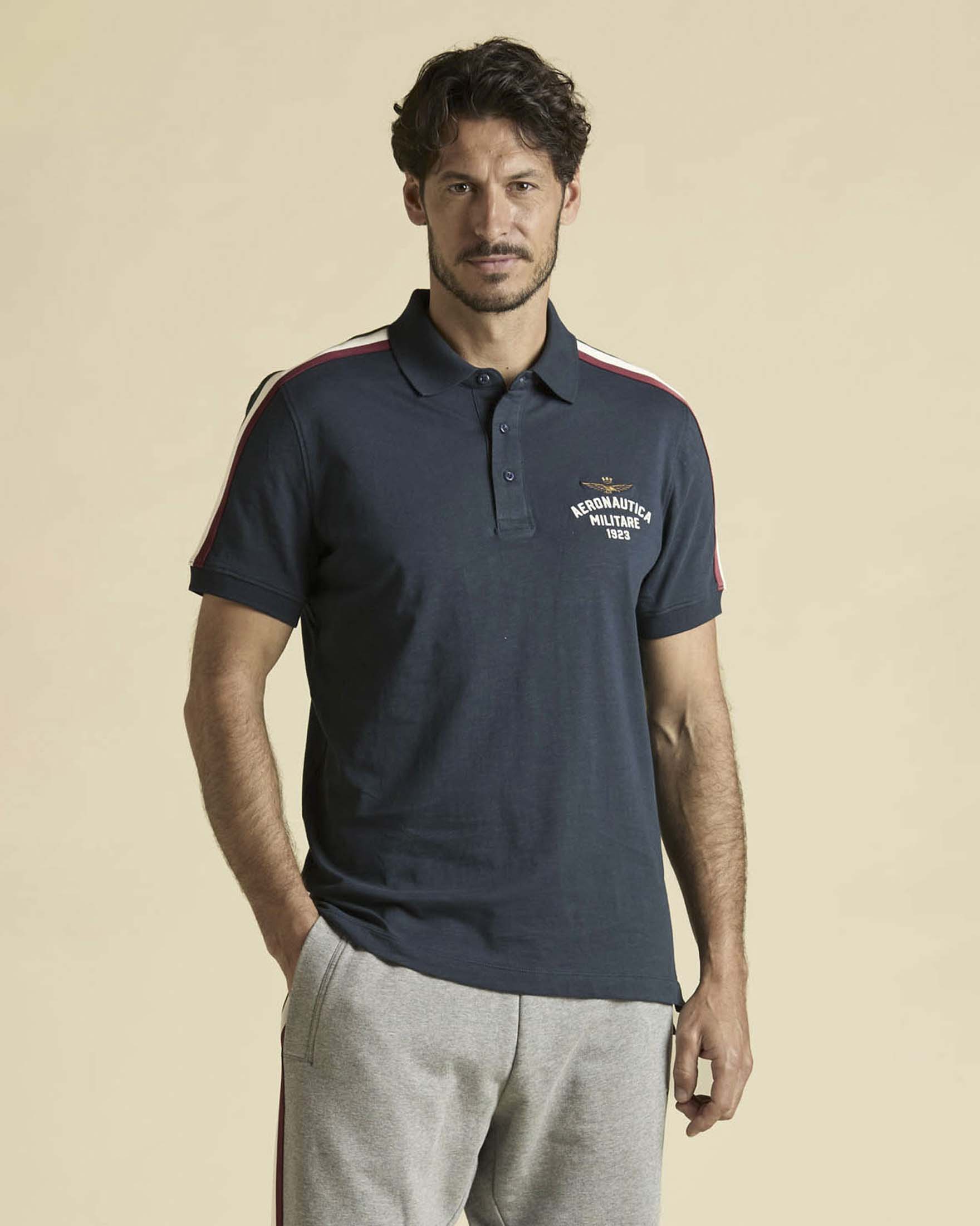 Polo mezza manica blu in cotone fiammato con bande tricolore