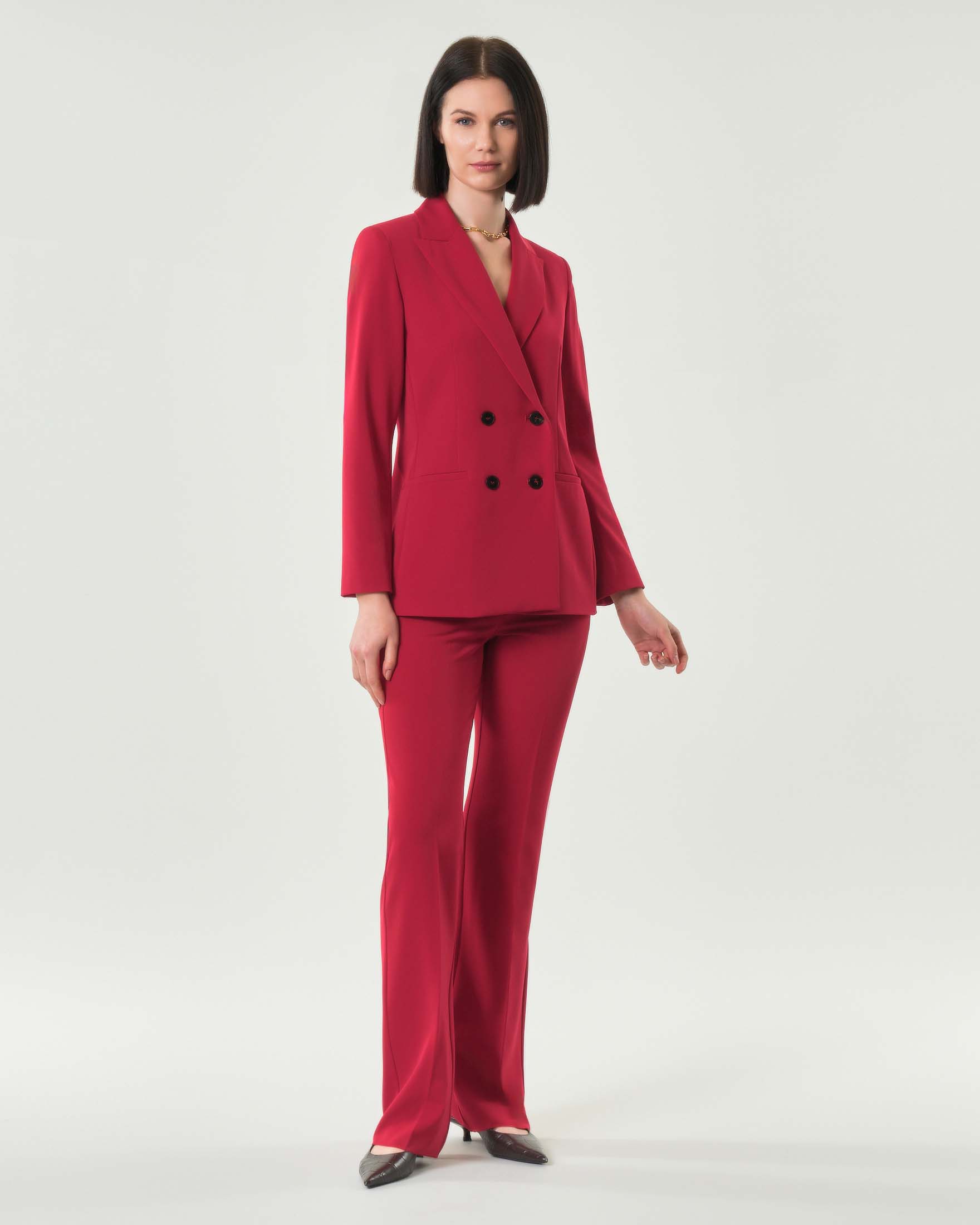 Pantalone rosso dritto aderente con chiusura nascosta e tasche laterali alla francese
