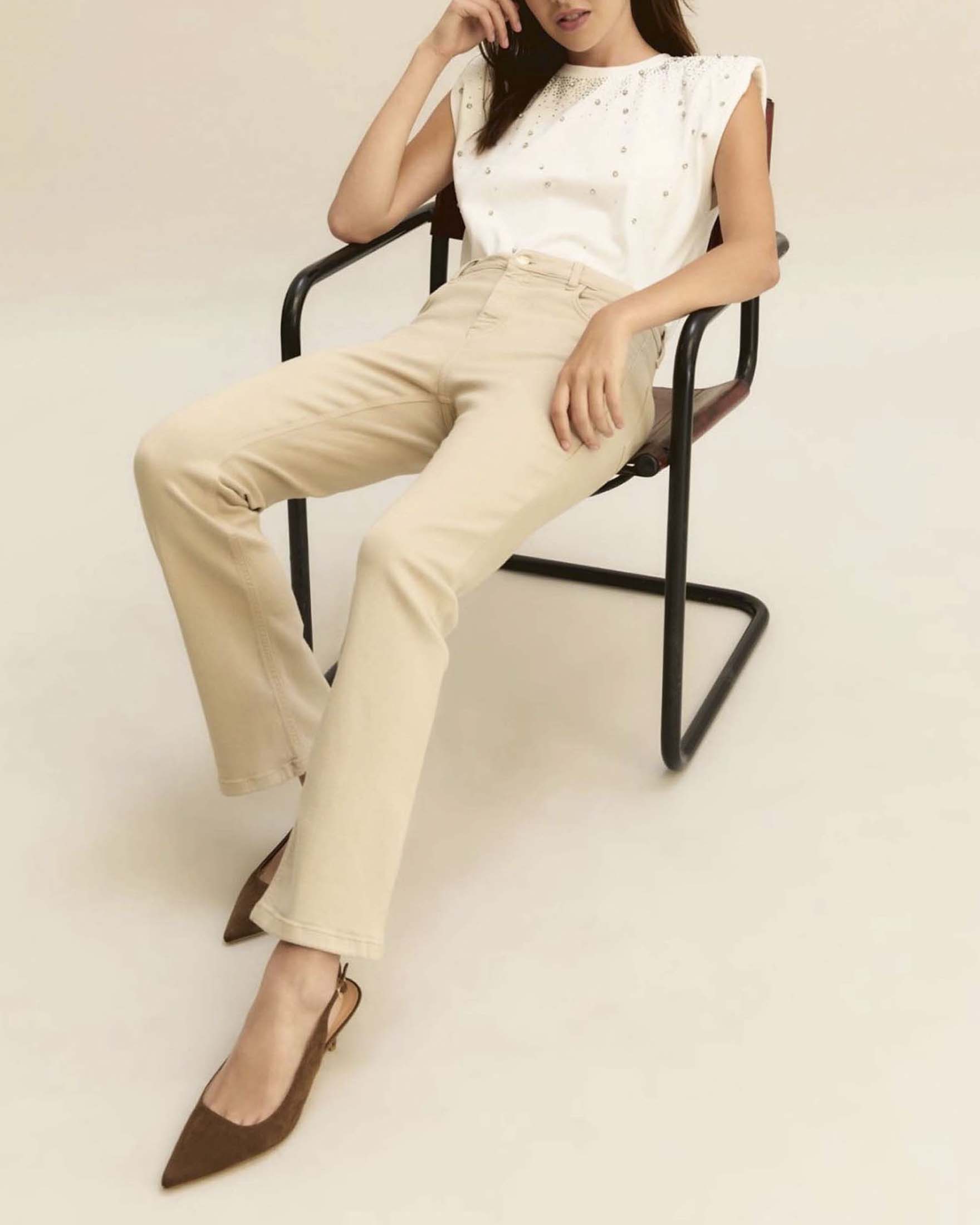 Pantaloni cinque tasche slim flare beige in bull di cotone strech