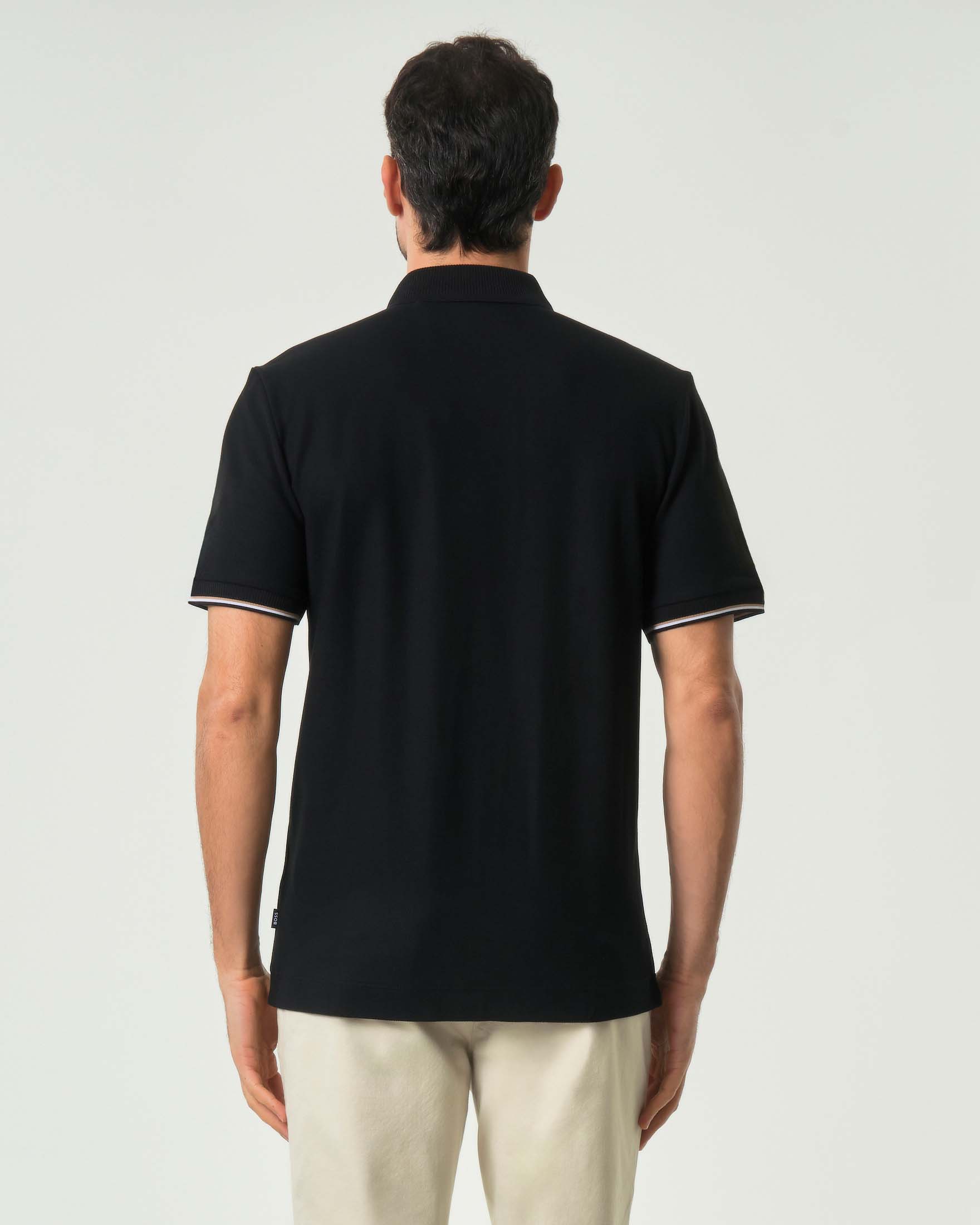 Polo mezza manica Boss nera in puro cotone con apertura zip e bordino sulle maniche