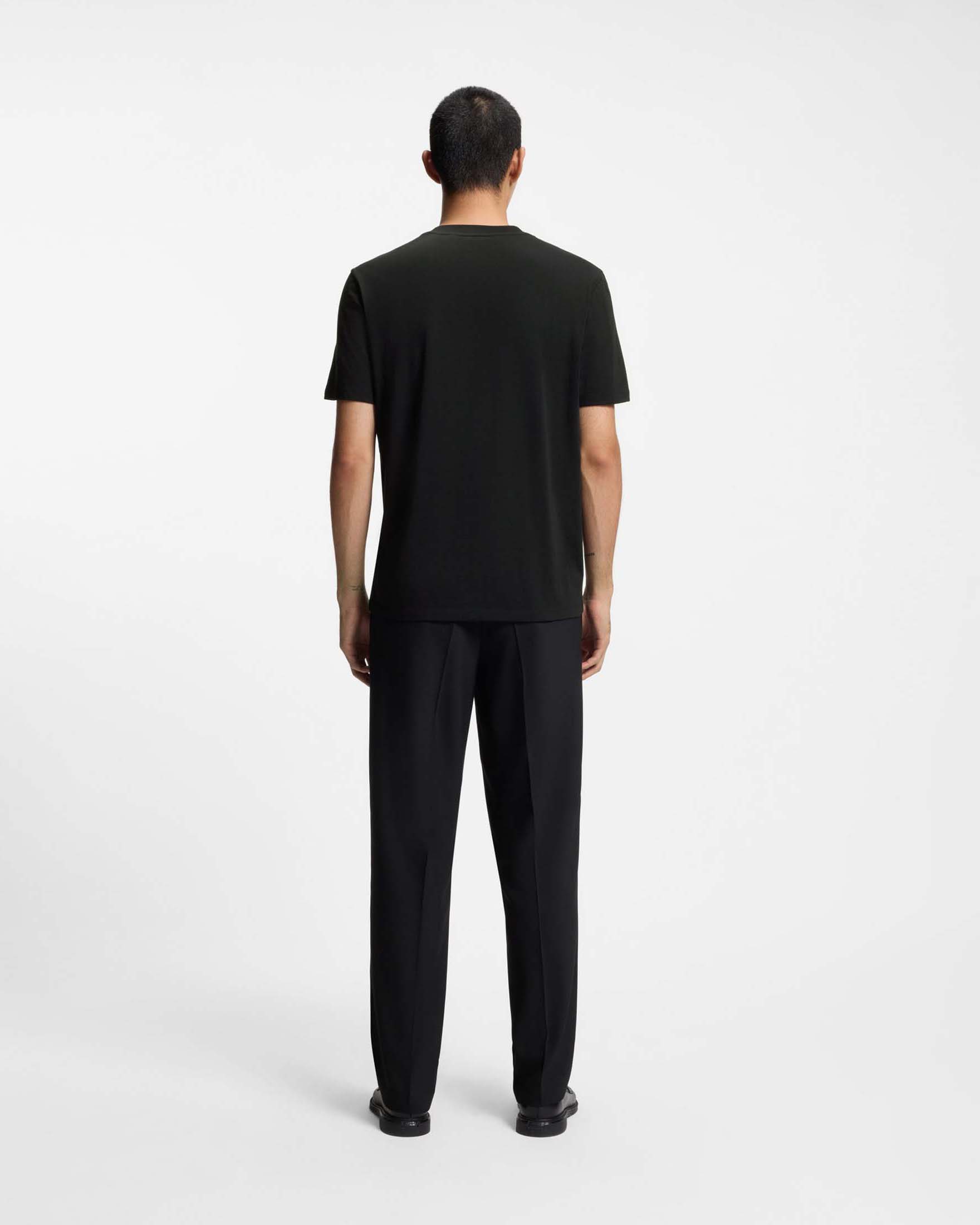 T-shirt Hugo nera in cotone con stampa grafica frontale image