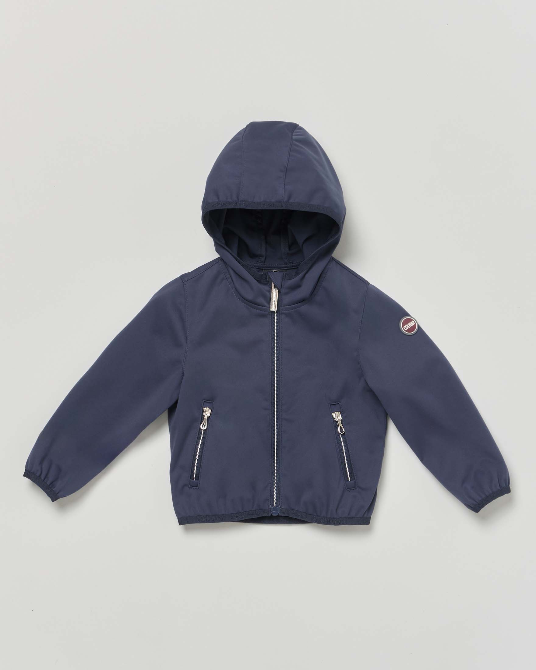 Giubbino Colmar Originals blu in softshell elasticizzato con cappuccio