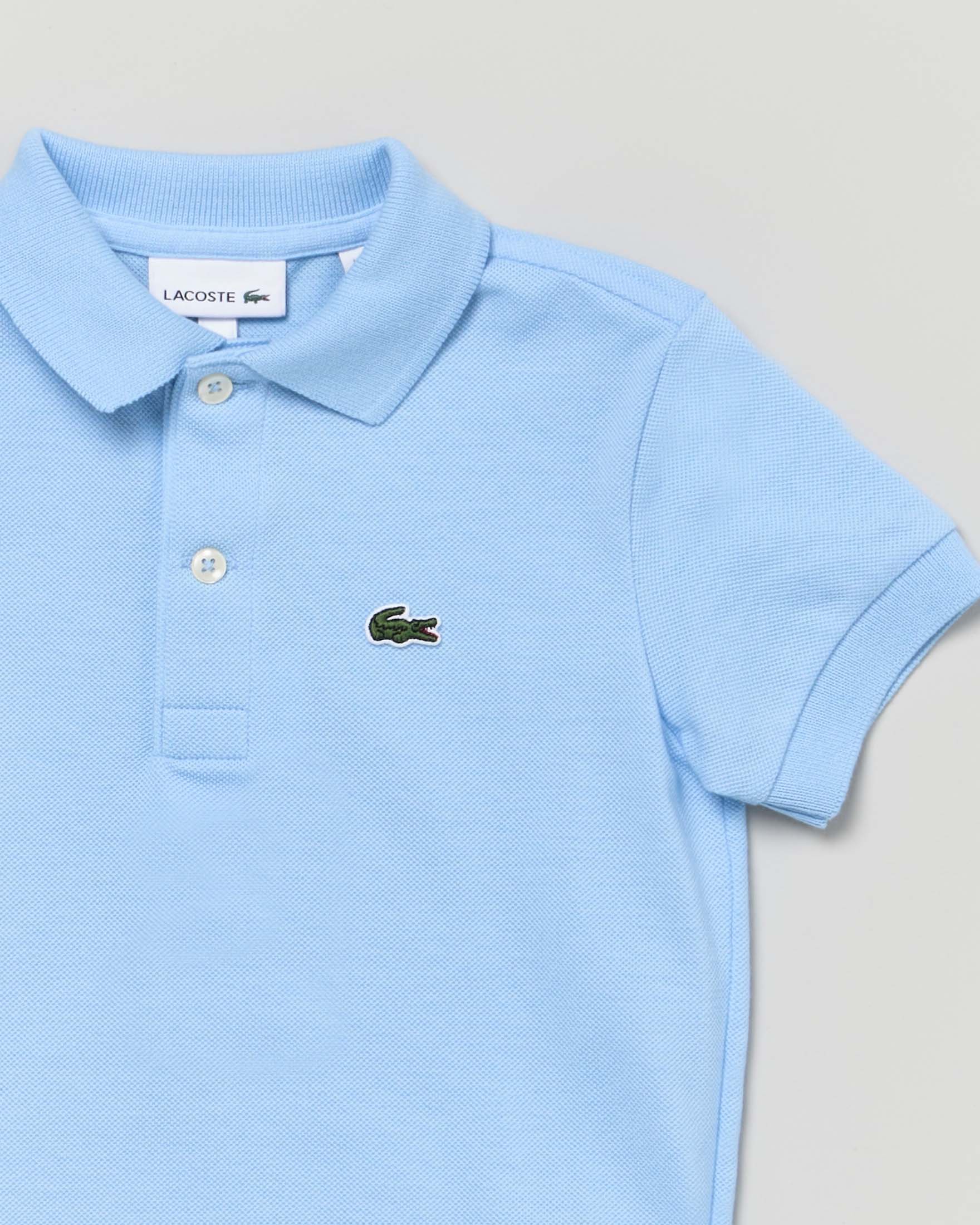 Polo Lacoste azzurra in piqué di puro cotone image