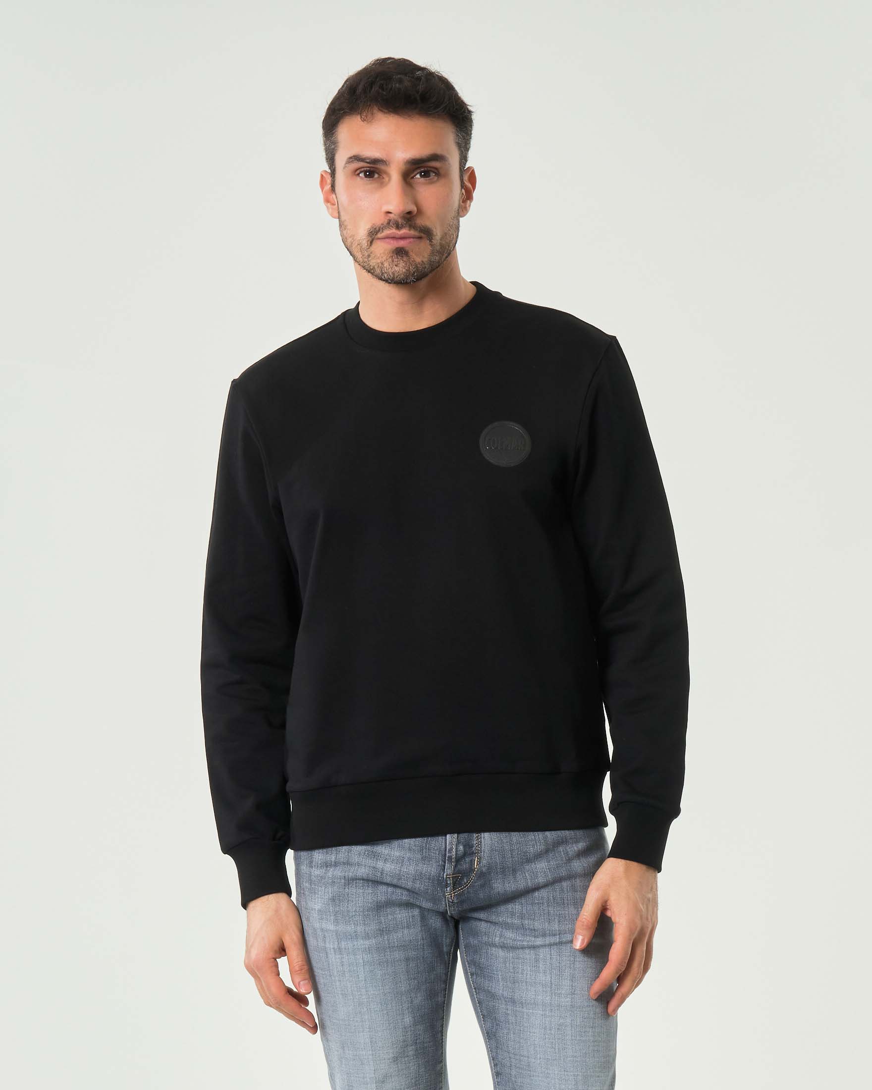 Felpa nera Colmar Originals con logo bollo applicato tono su tono sul petto