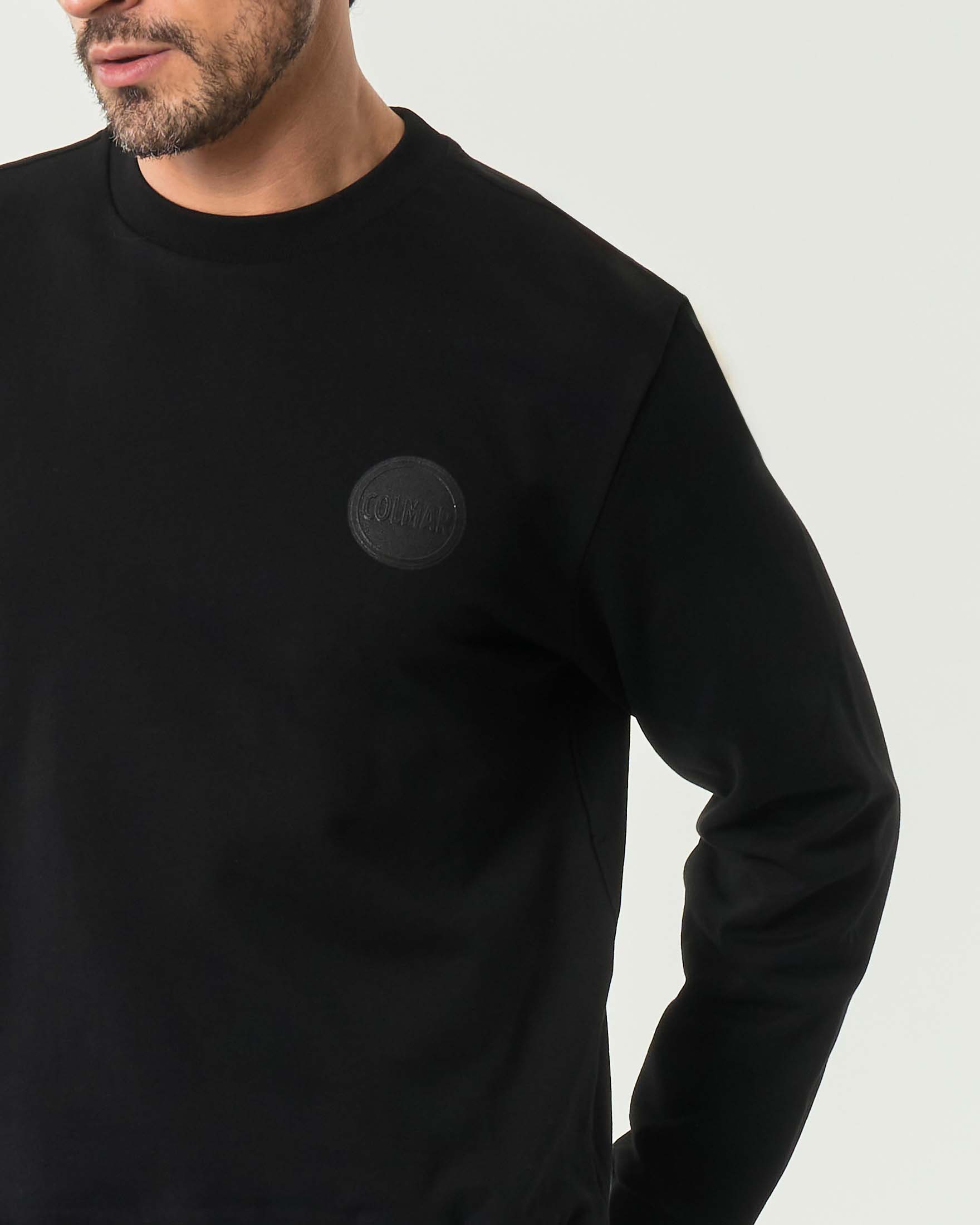 Felpa nera Colmar Originals con logo bollo applicato tono su tono sul petto image