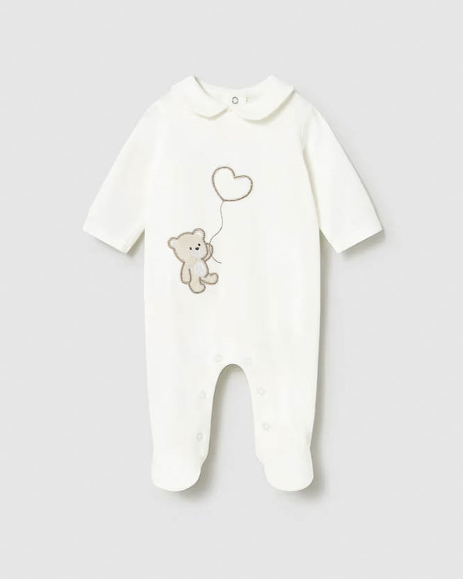 Tutina avorio in cotone stretch con orsetto sul davanti