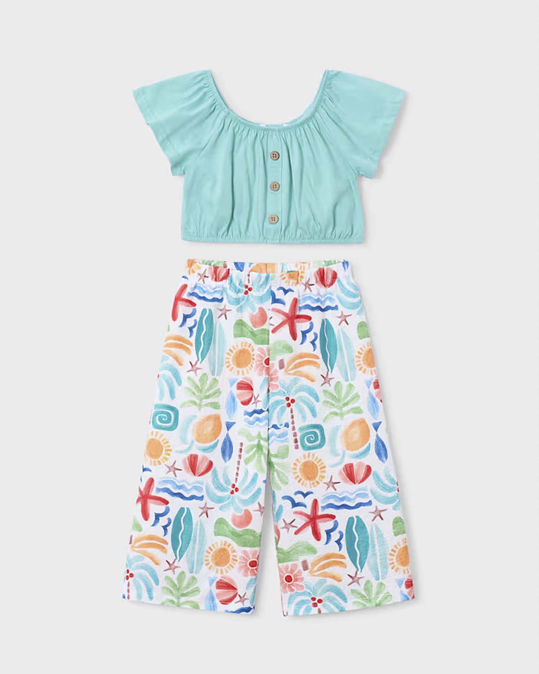 Completo verde acqua in cotone con top crop e pantaloni fantasia multicolore