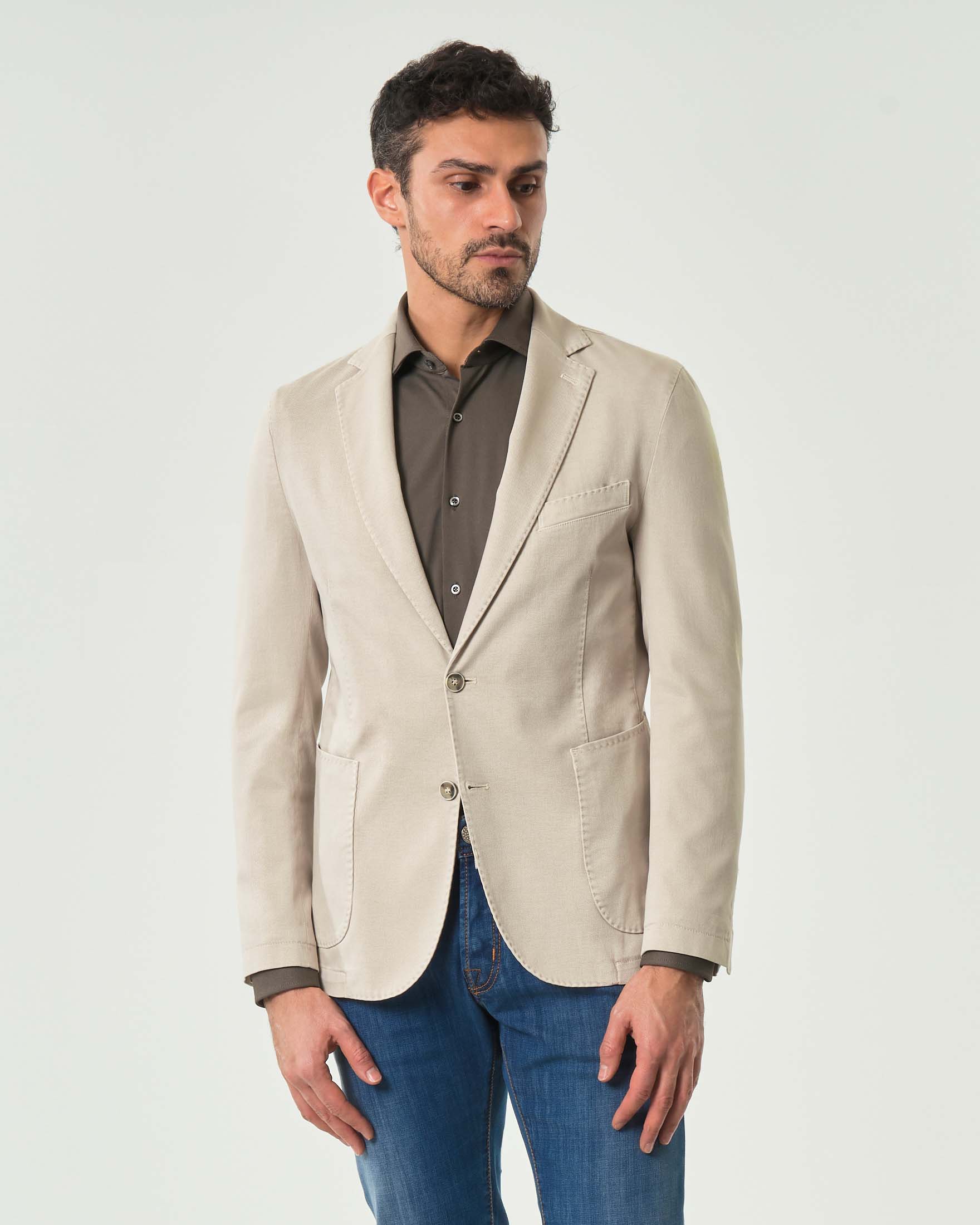 Blazer beige in cotone stretch micro armatura con tasche a toppa e impunture a vista