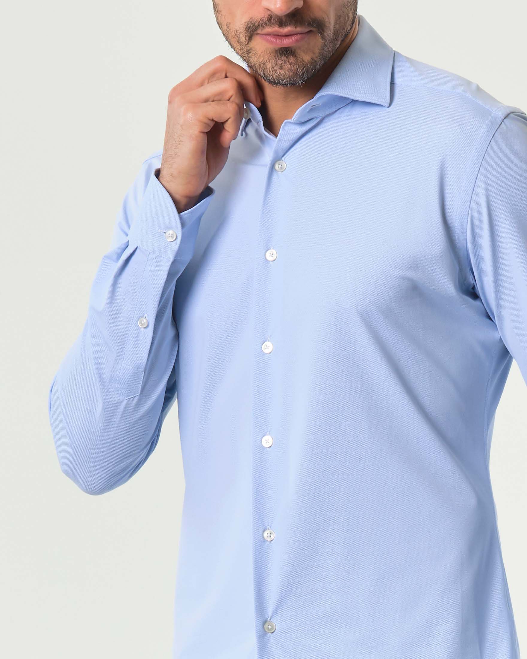 Camicia Xacus azzurra micro armatura in tessuto tecnico active tailor fit image