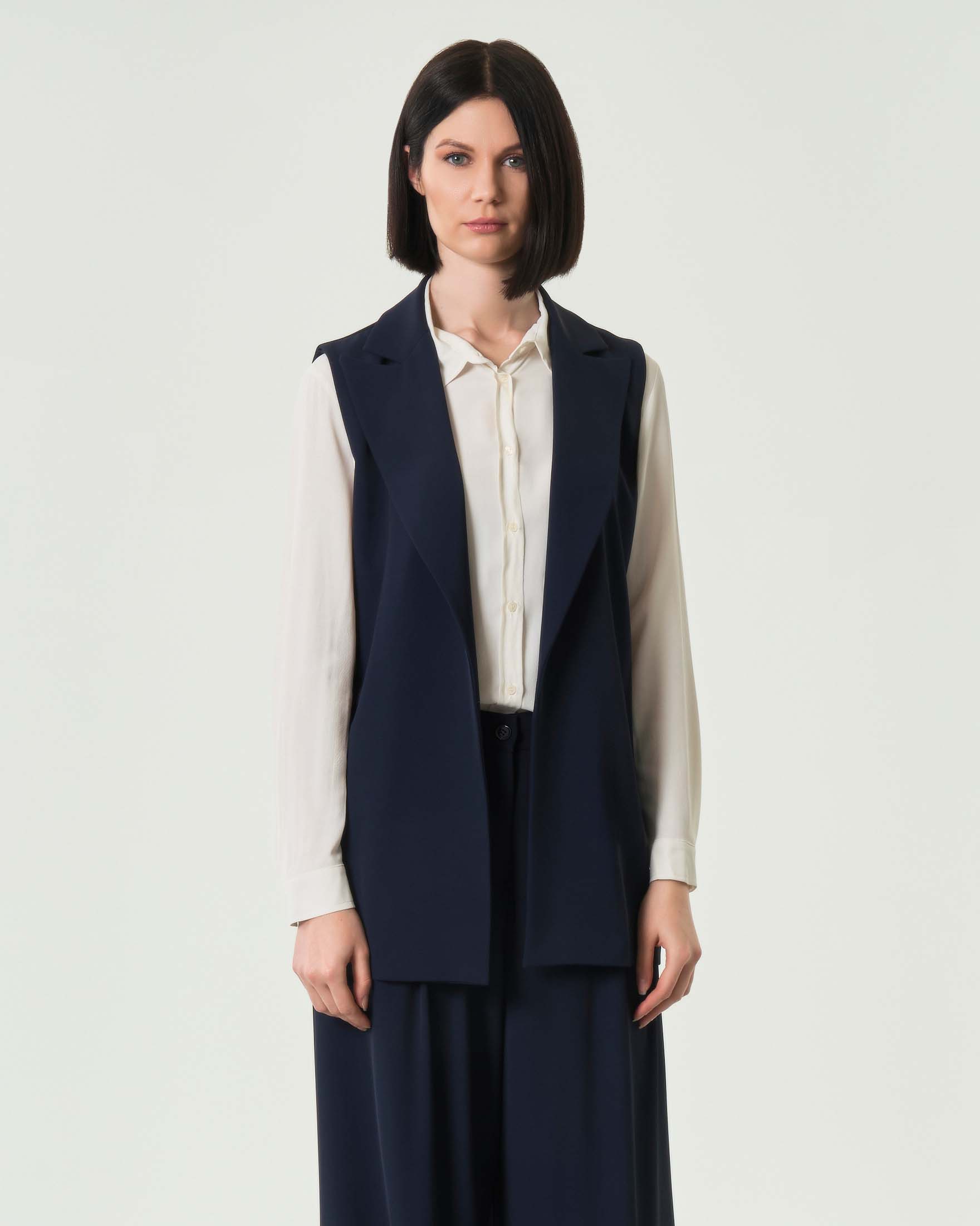 Gilet senza bottoni blu in cady con scollo a rever