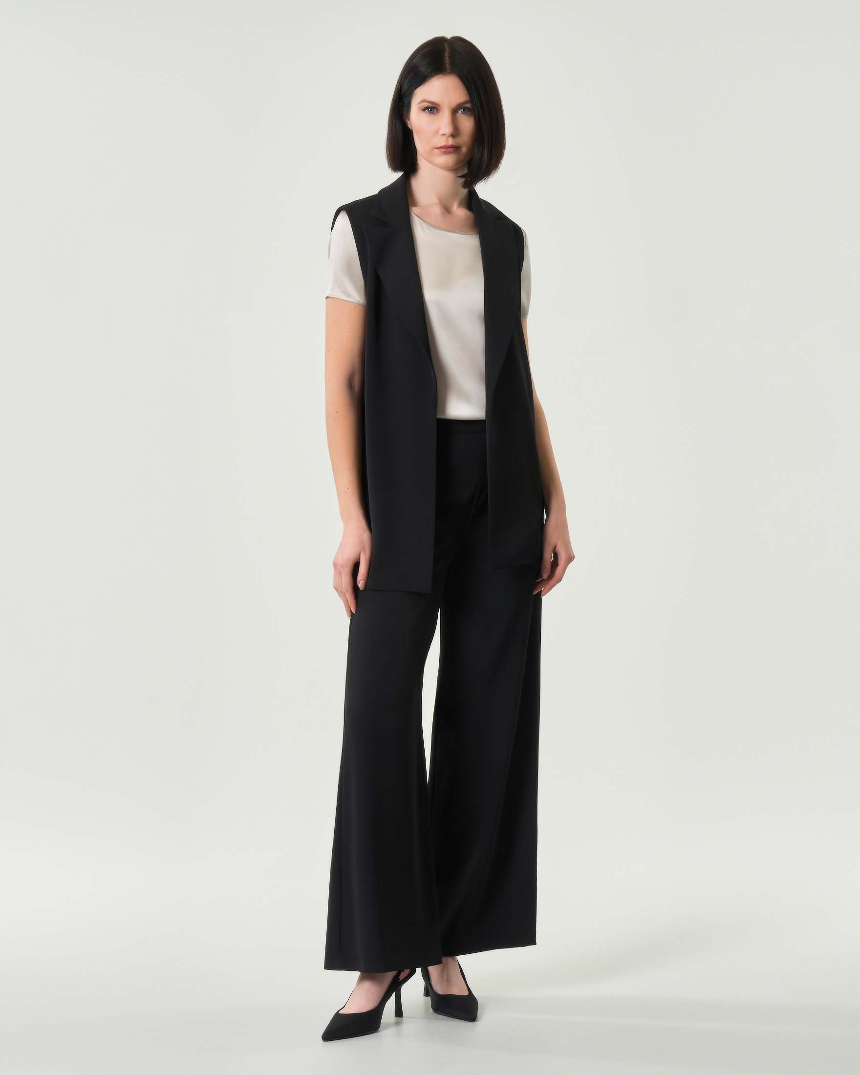 Gilet senza bottoni nero Hlo! in cady con scollo a rever image