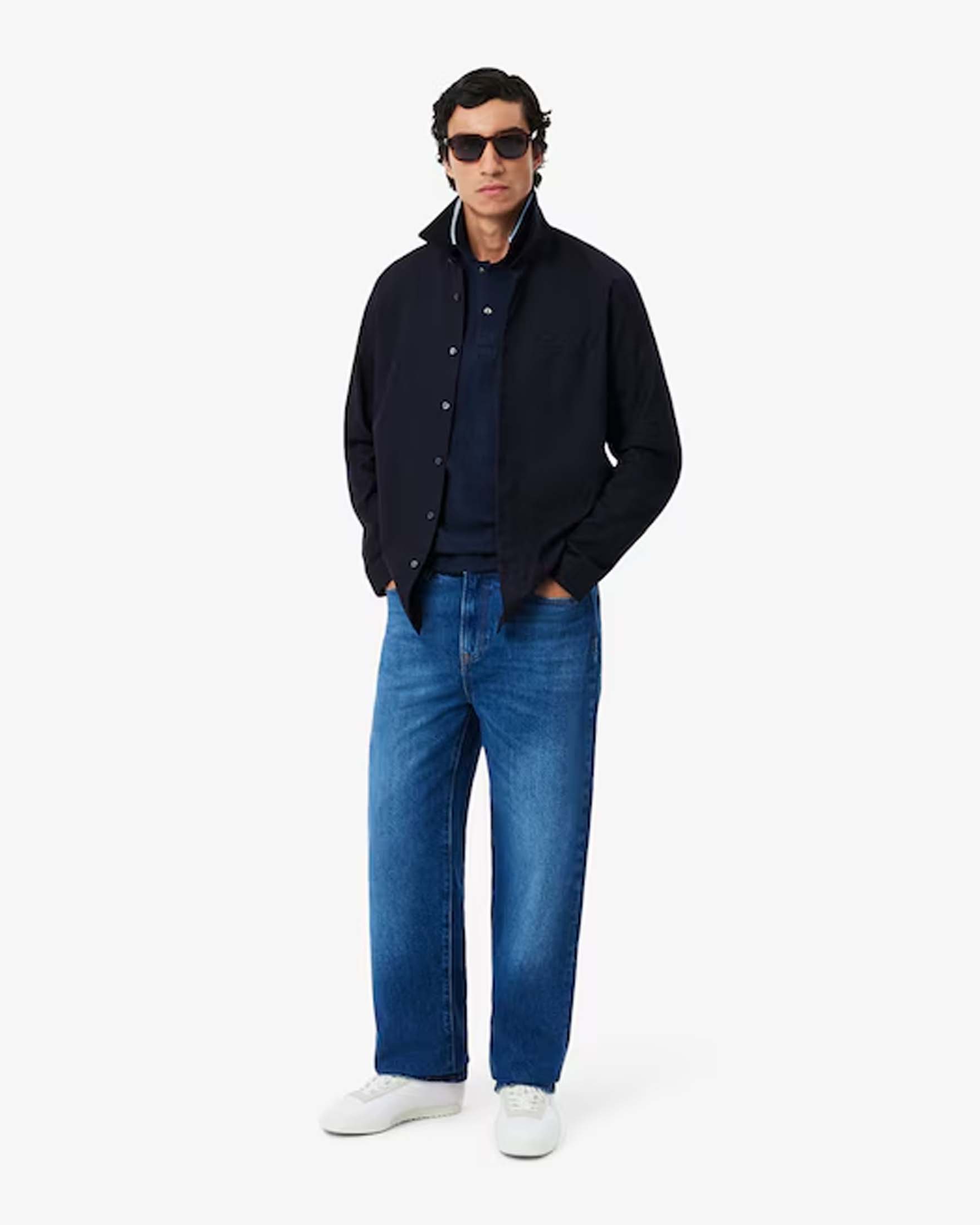 Polo Lacoste blu mezza manica regular fit L.12.12 con bordino azzurro