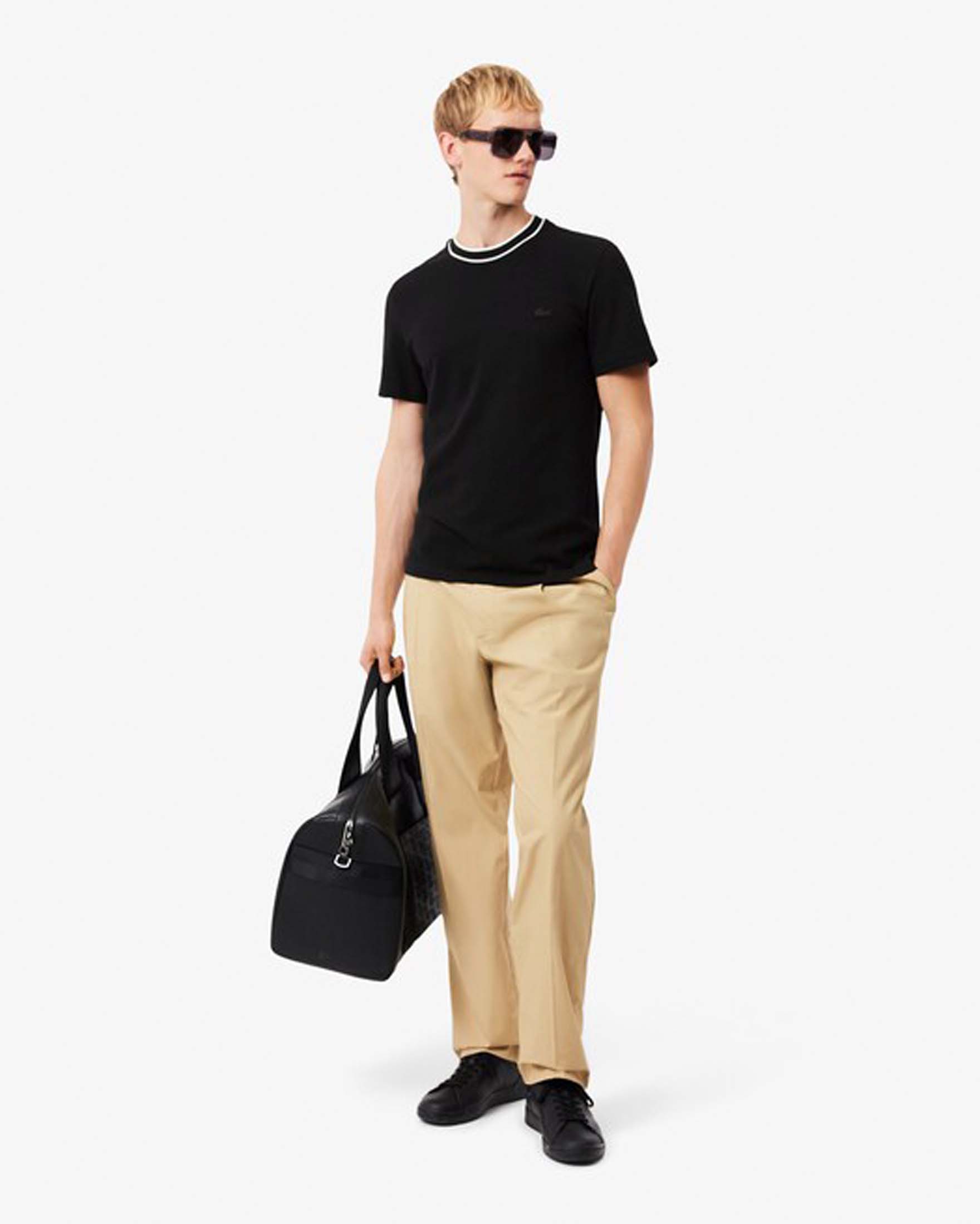 T-shirt Lacoste nera mezza manica in piquè di cotone stretch con bordino bianco sul collo