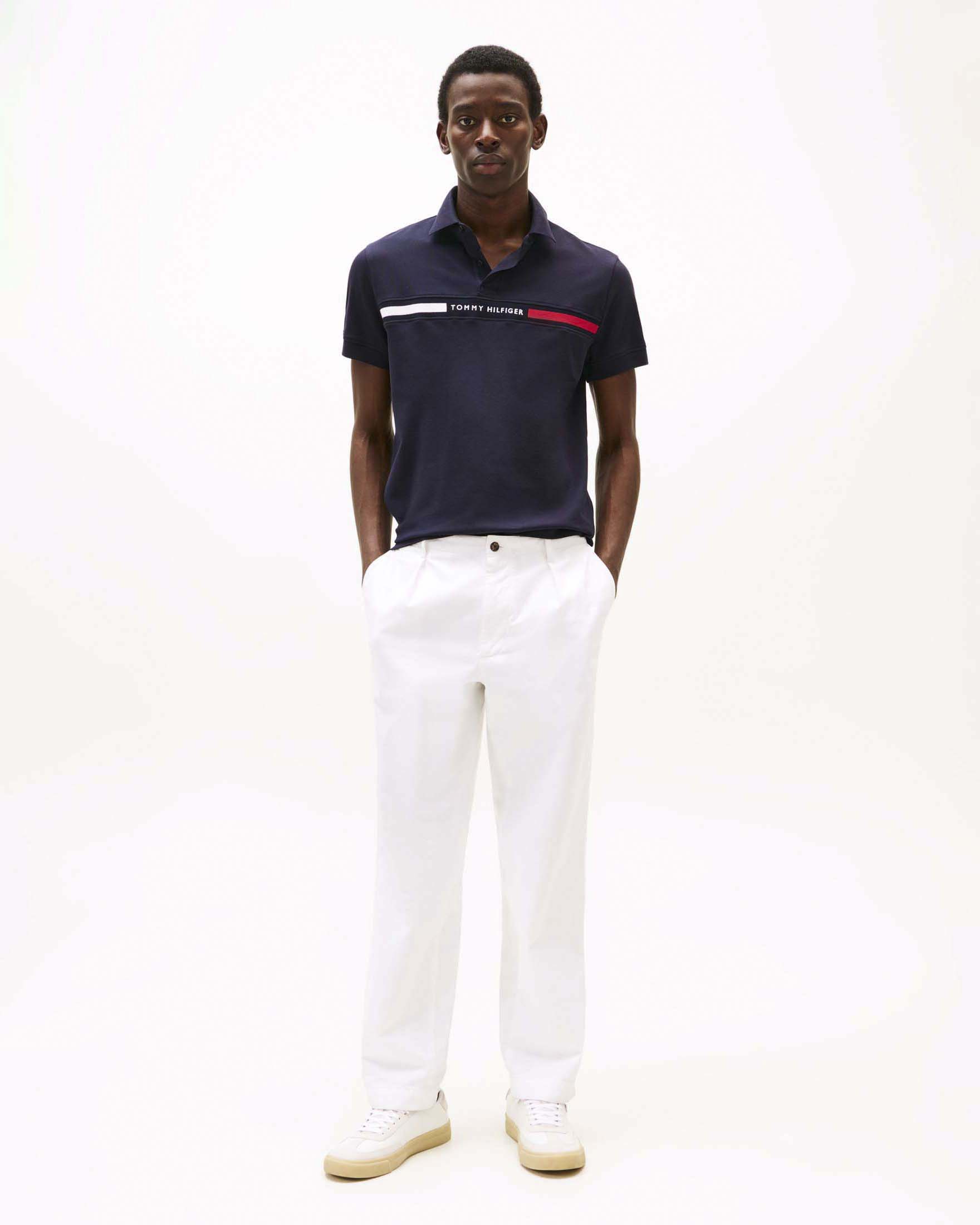 Polo blu scuro in misto cotone con inserto logo ricamato sul petto