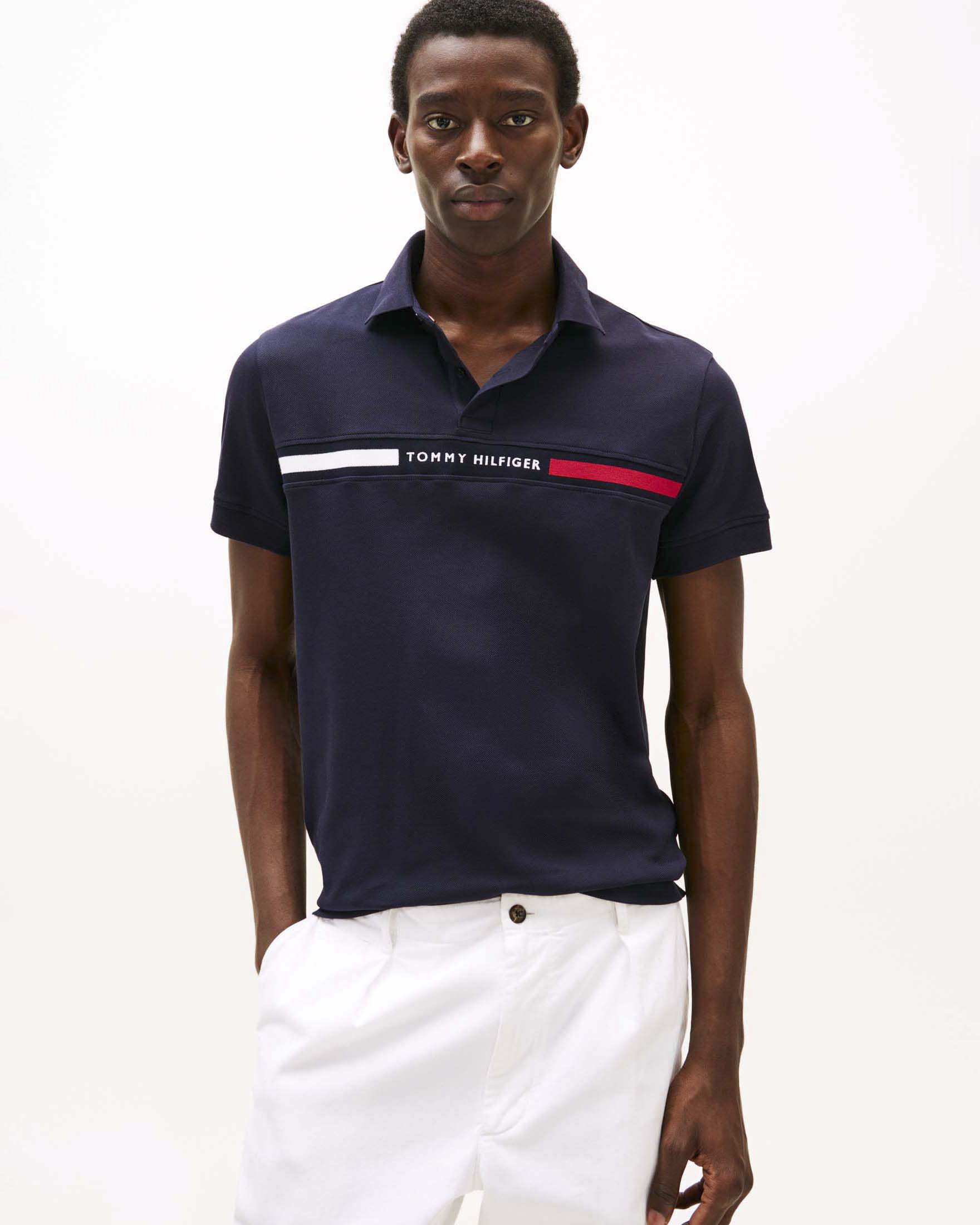 Polo Tommy Hilfiger blu scuro in misto cotone con inserto logo ricamato sul petto image