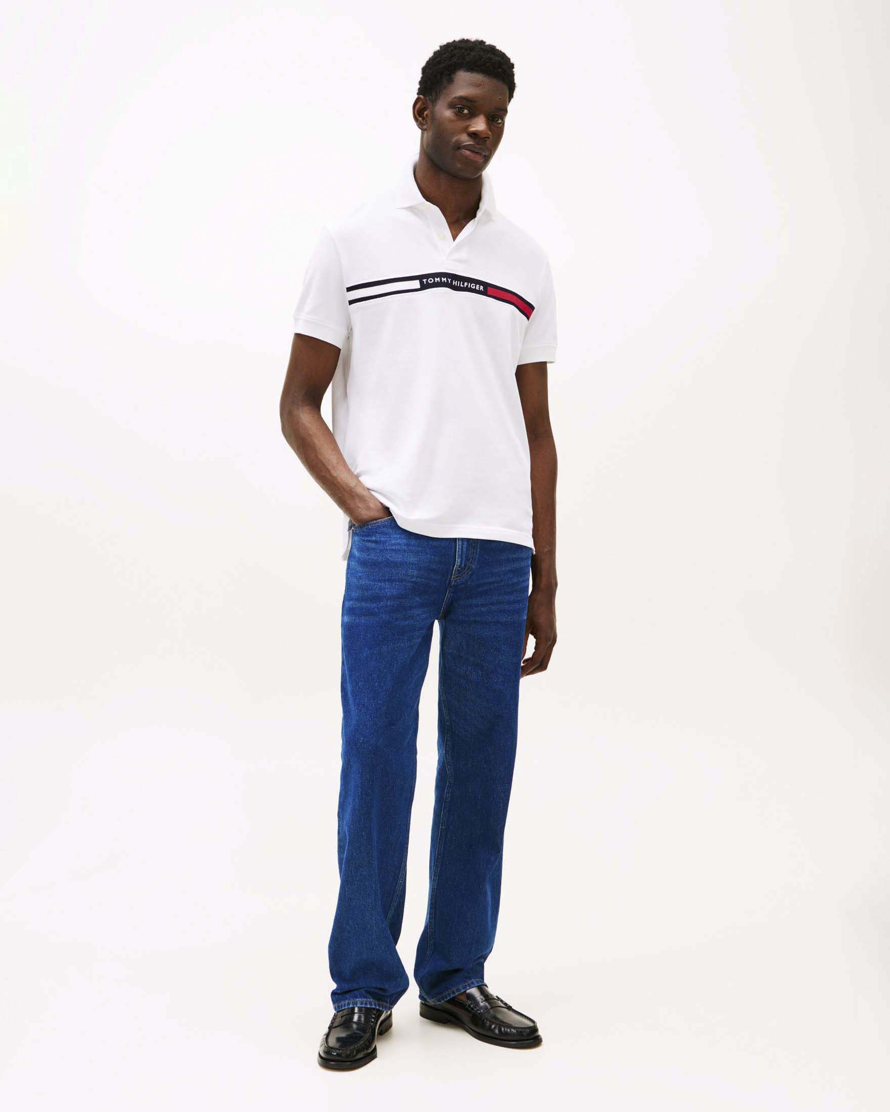 Polo Tommy Hilfiger bianca in misto cotone piqué con fascia logo ricamata sul petto