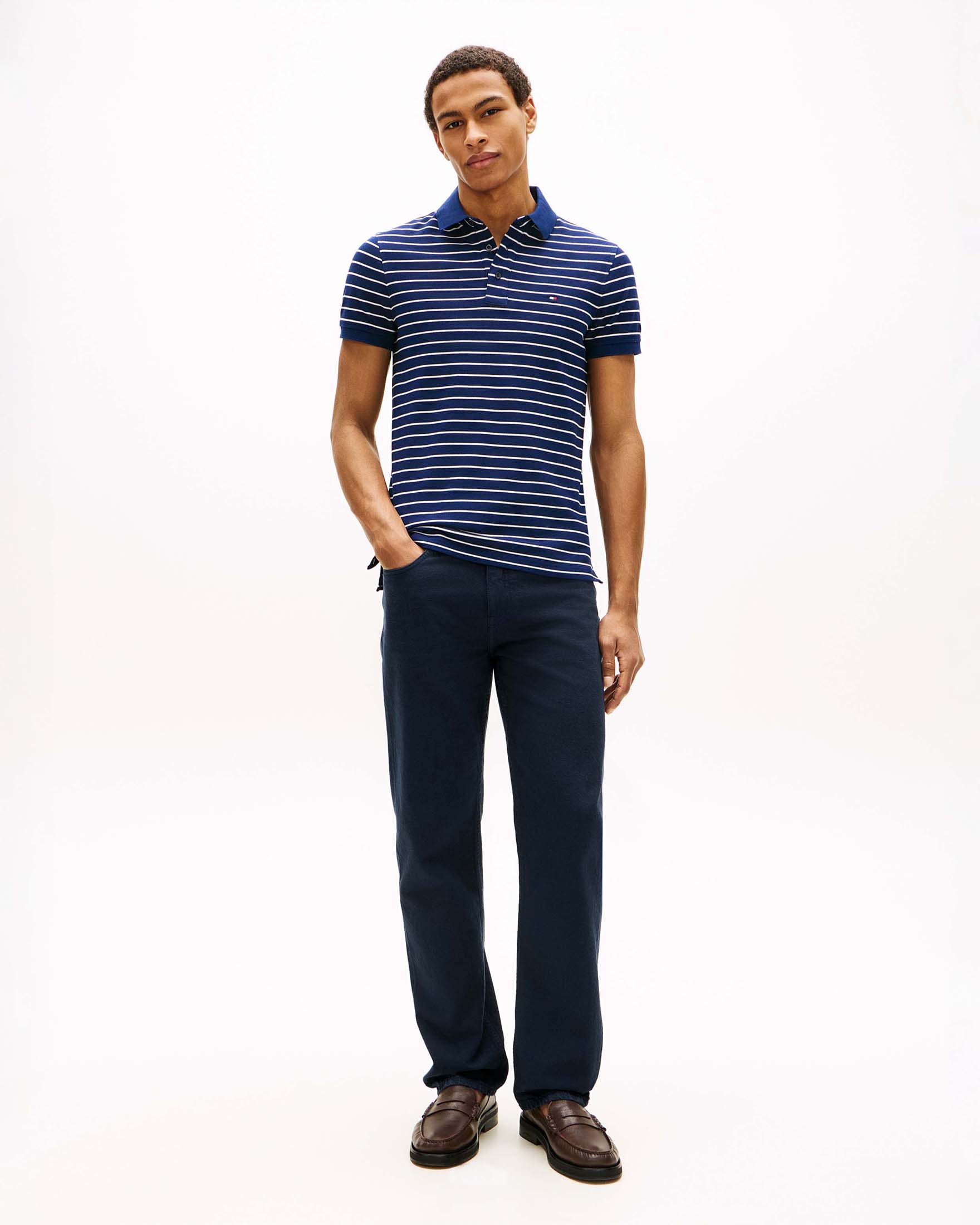 Polo Tommy Hilfiger blu a righe bianche in cotone piqué elasticizzato con logo ricamato