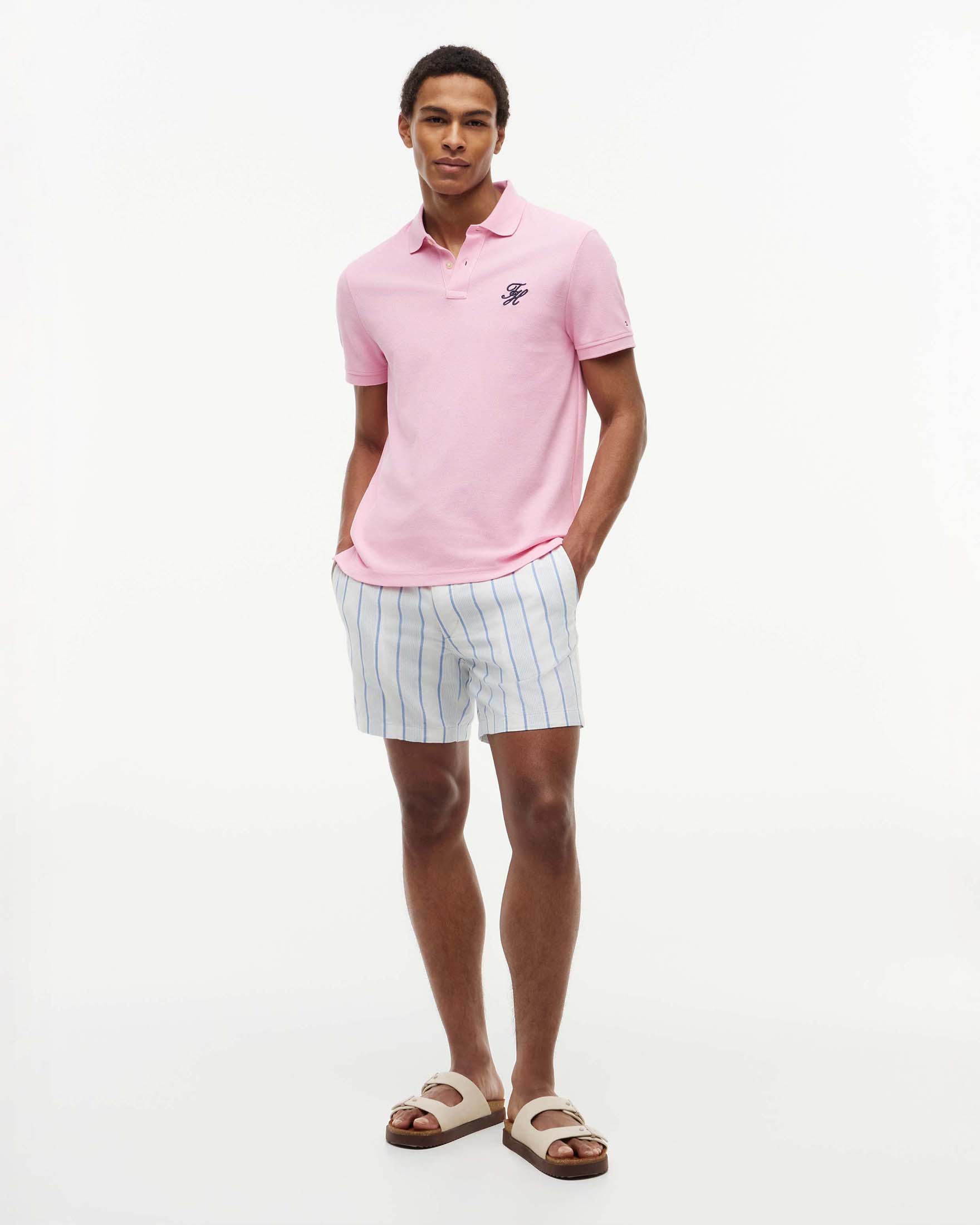 Tommy Hilfiger — Polo Tommy Hilfiger rosa in piqué di cotone con logo ricamato sul petto