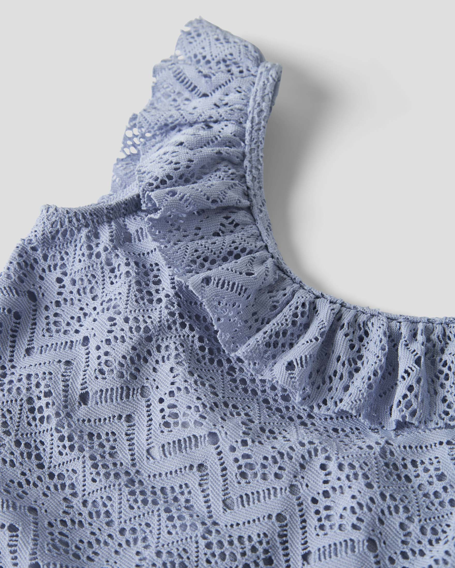 Costume intero Lil'Atelier azzurro con pizzo e volant
