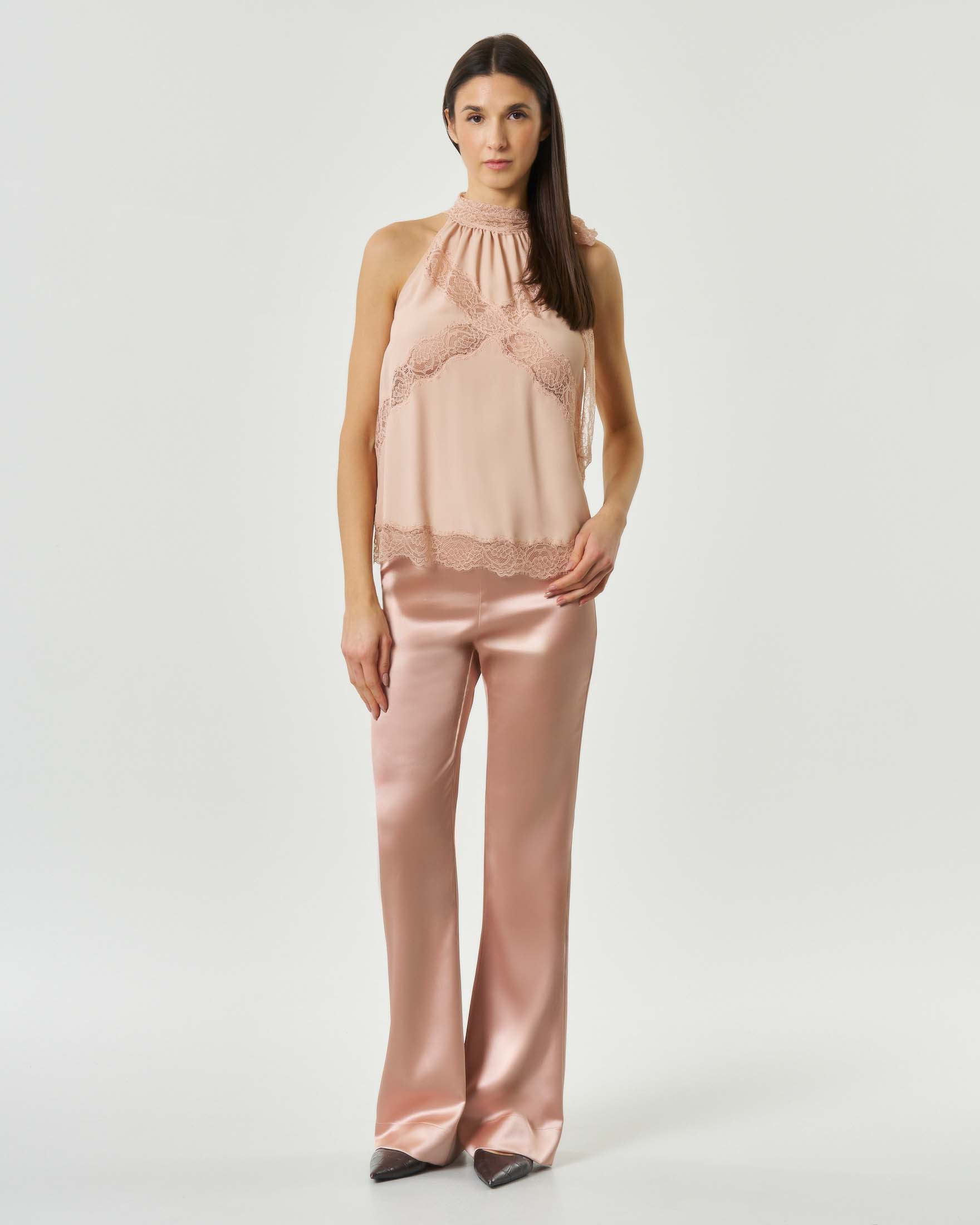 Pantaloni a zampa color cipria con chiusura zip laterale