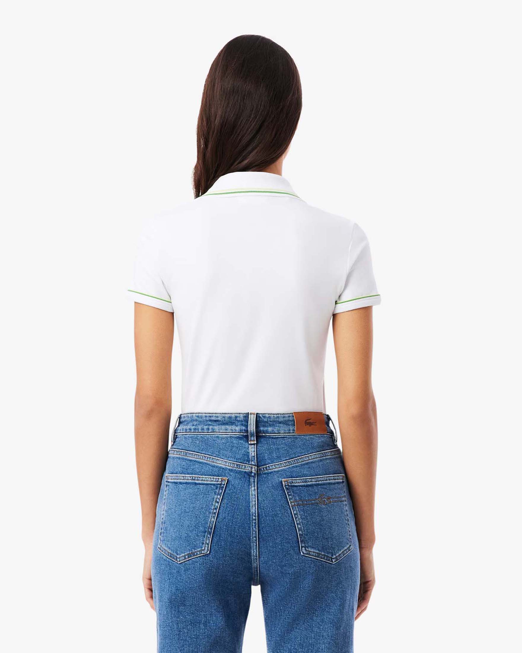 Polo slim-fit bianca Lacoste con bordino verde e lime in cotone elasticizzato image